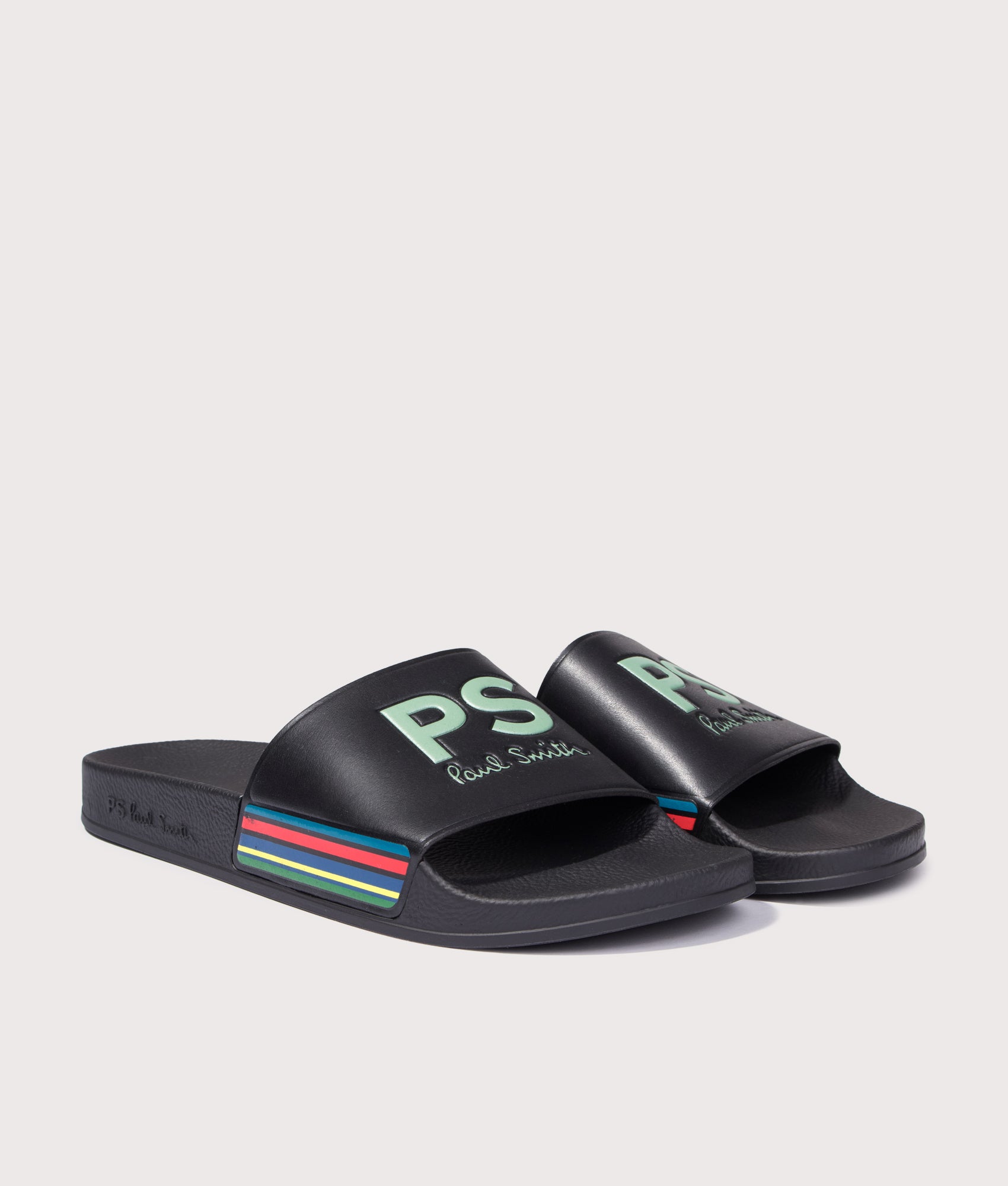 PS Paul Smith Zed Black Sports Stripe Sliders in Black at EQVVS Menswear. Angled front shot.