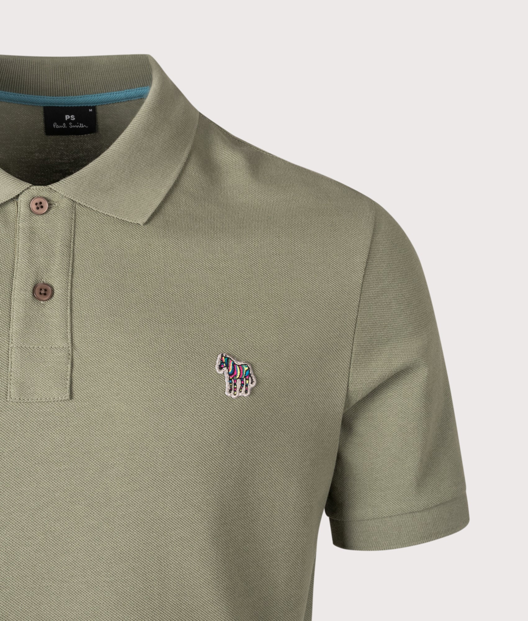 Zebra Logo Polo Shirt. Shot by EQVVS. Detail shot.
