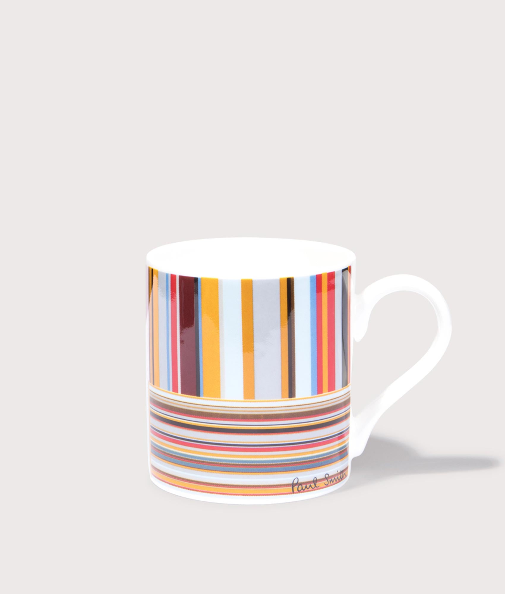 PS Paul Smith Bone China Printed Mug Multicoloured Signature Stripe. Side shot.