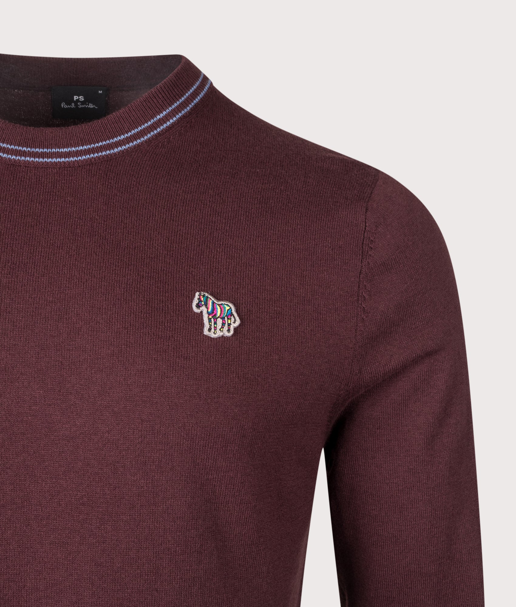 Zebra Badge Jumper. Shot by EQVVS. Detail shot.
