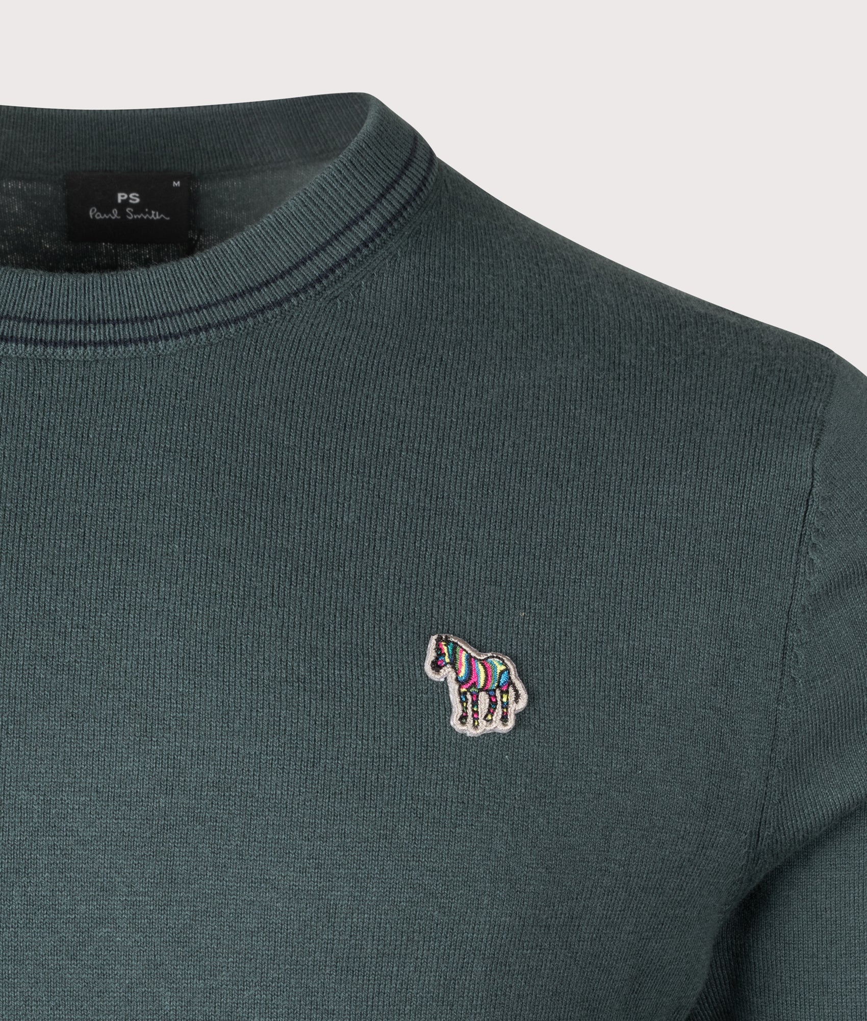 Zebra Badge Jumper. Shot by EQVVS. Detail shot.