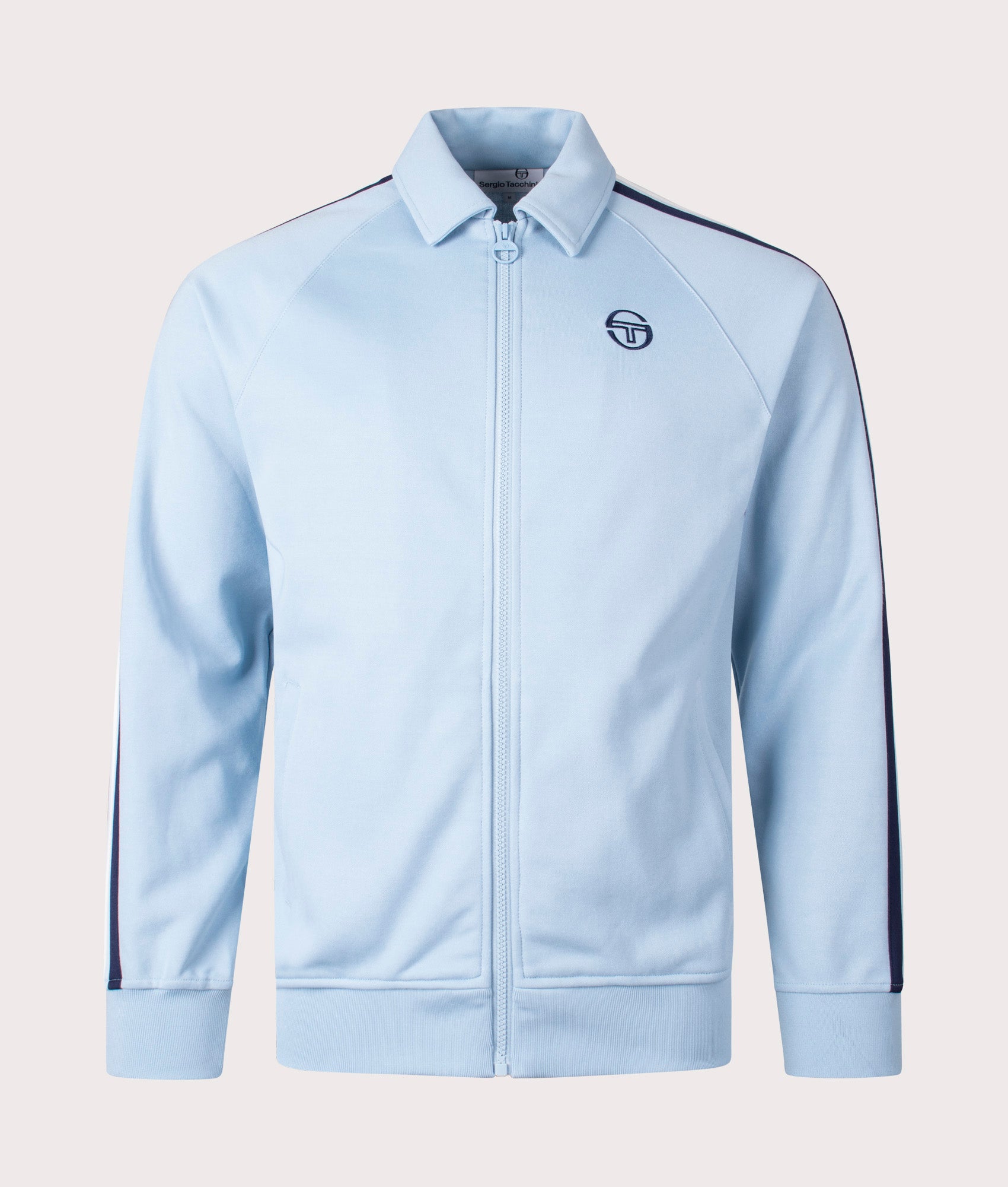Renshaw Track Top Sergio Tacchini, celestial blue. Shot at EQVVS. Front shot. 