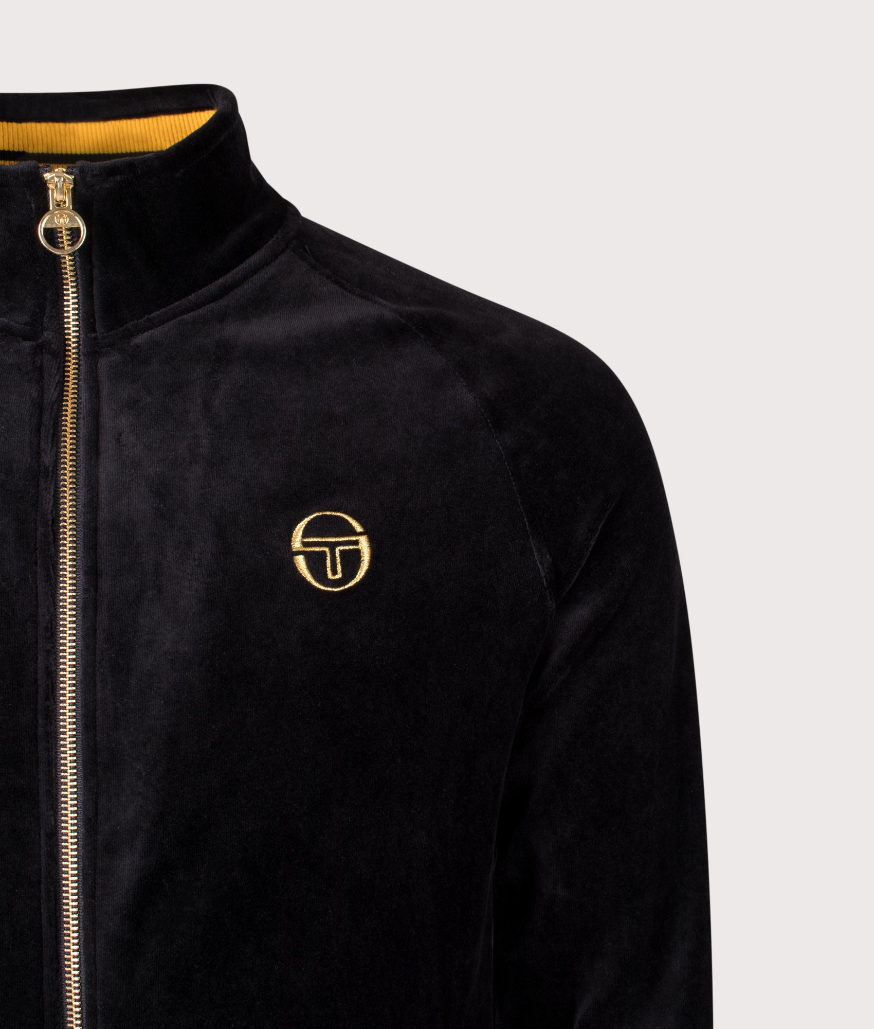 Court Velour Track Top by Sergio Tacchini in Black. Shot by EQVVS. Detail shot.