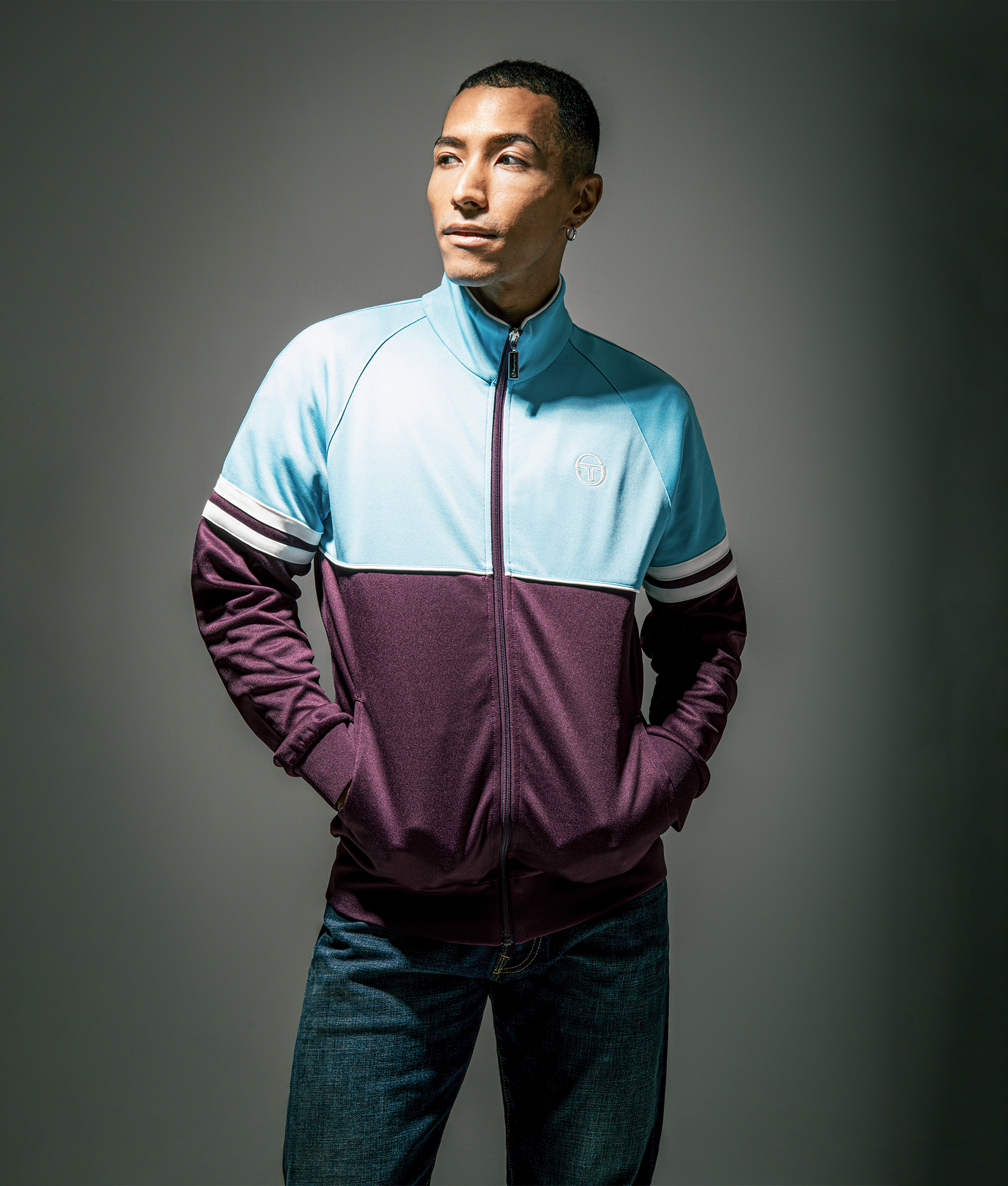 Sergio Tacchini Orion Track Jacket in Milky Blue, Winter Bloom and Gardenia at EQVVS Menswear. Campaign shot