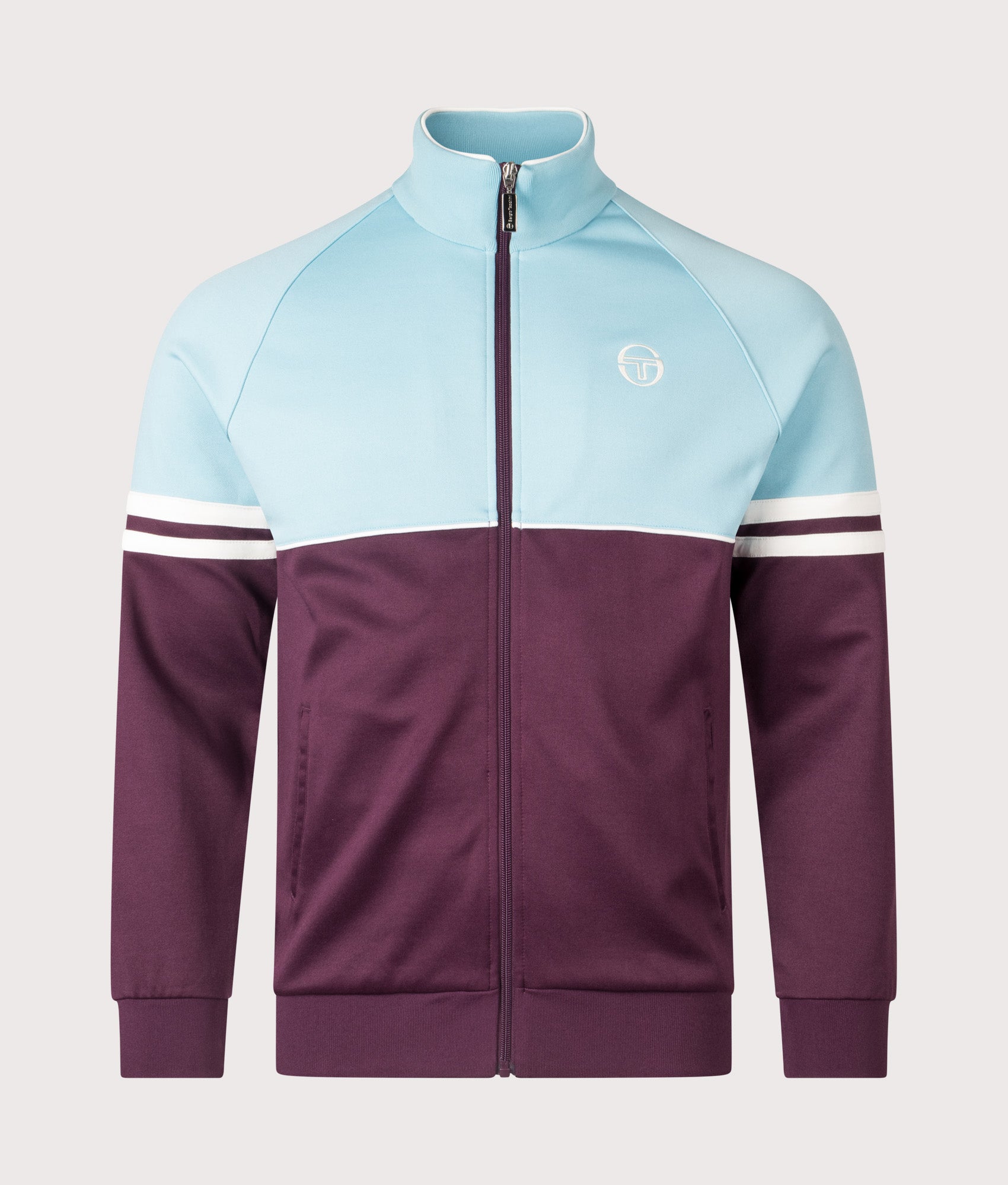 Sergio Tacchini Orion Track Jacket in Milky Blue, Winter Bloom and Gardenia at EQVVS Menswear. Front shot.