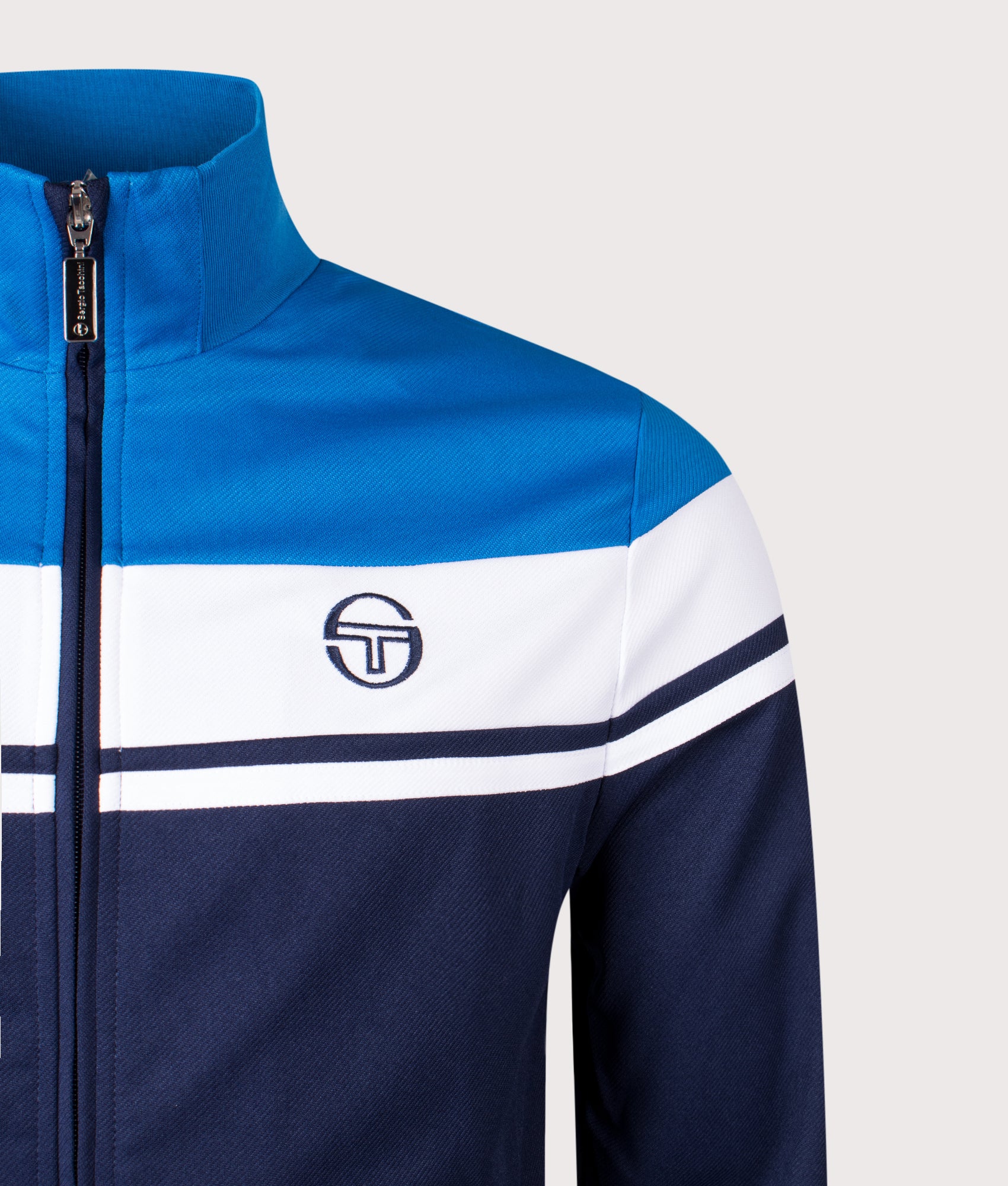 Damarindo Track Top in Directoire Blue/White/Maritime Blue | Sergio Tacchini | EQVVS | Front detail shot 