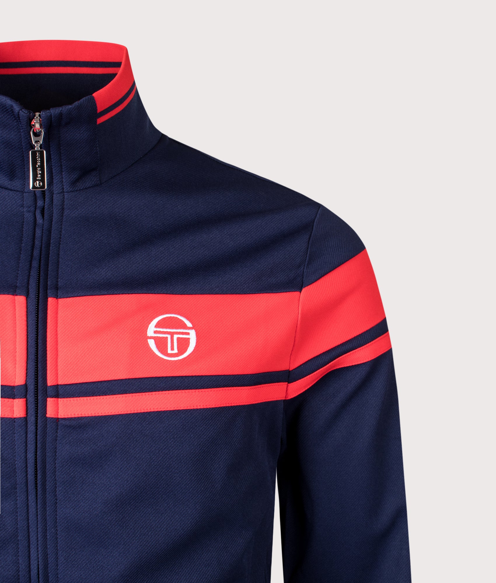 Damarindo Track Top in Maritime Blue/Adrenaline Rush | Sergio Tacchini | EQVVS | Front detail shot 