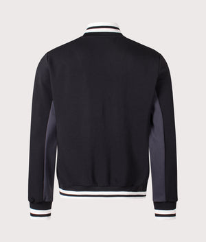 Tiebraker Funnel Neck Track Jacket by FILA in Black/Charcoal/Gardenia. Shot by EQVVS. Back shot.