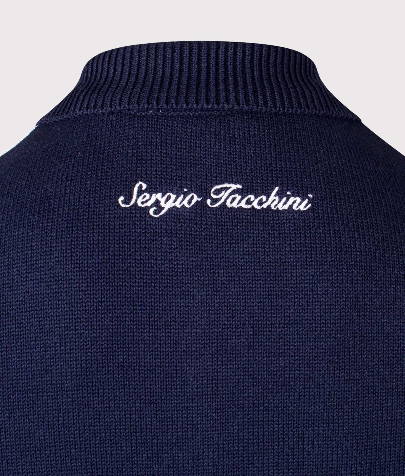 Sergio Tacchini Cipri Knit Cardigan in Maritime Blue and Gardenia at EQVVS Menswear. Back detail shot. 