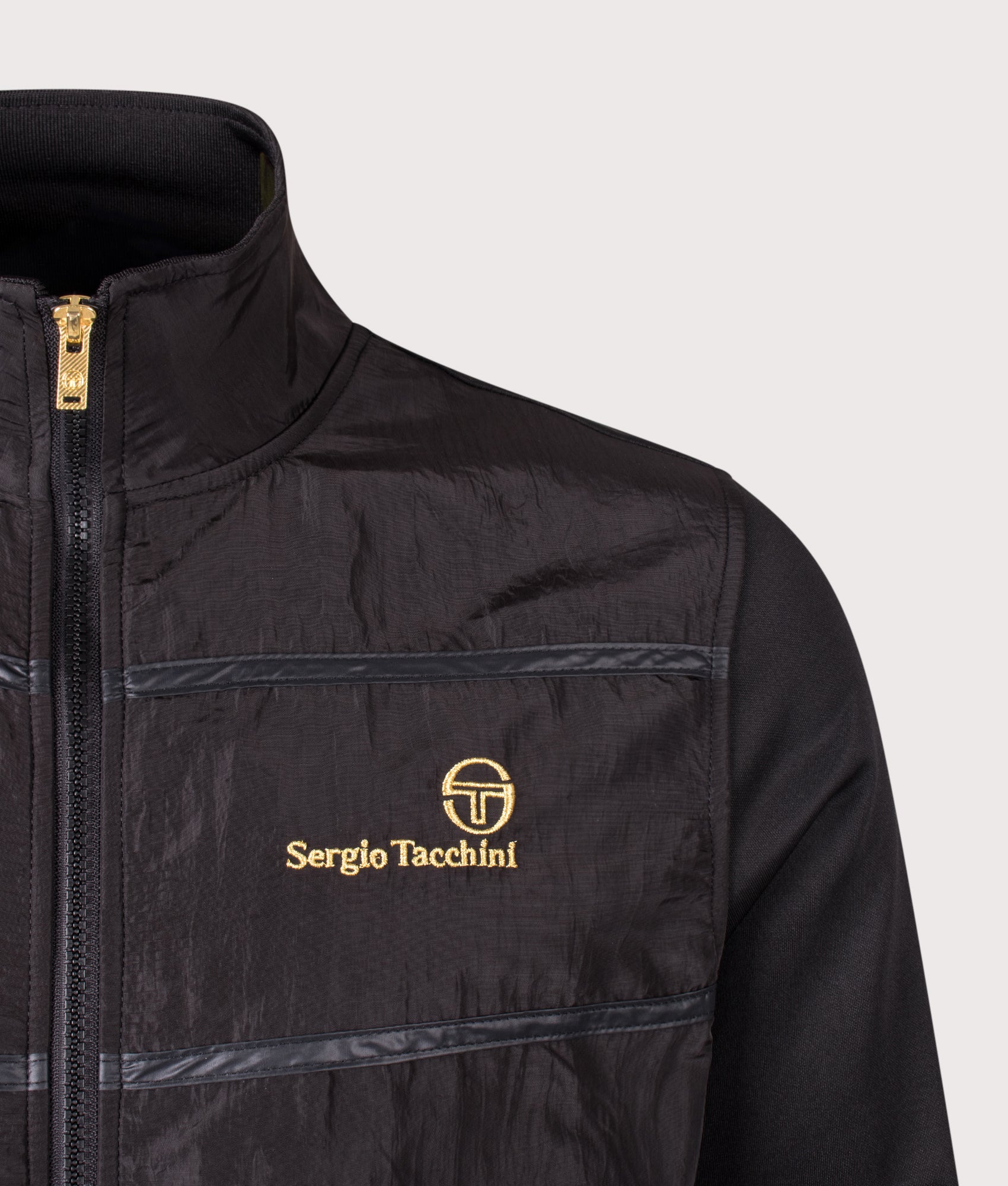 Cassio Track Top in Black by Sergio Tachinni. Shot by EQVVS. Detail shot.