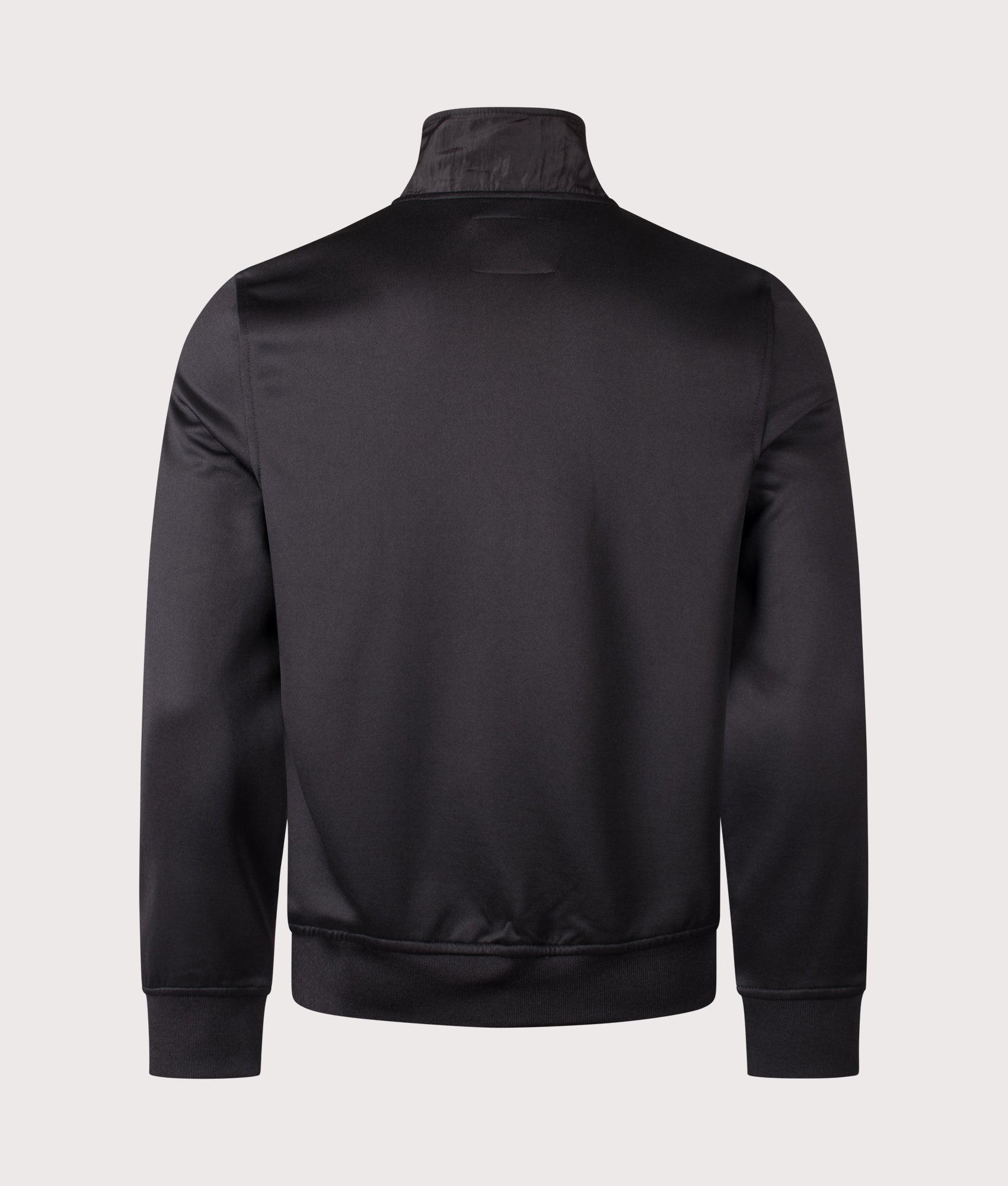 Cassio Track Top in Black by Sergio Tachinni. Shot by EQVVS. Back shot.