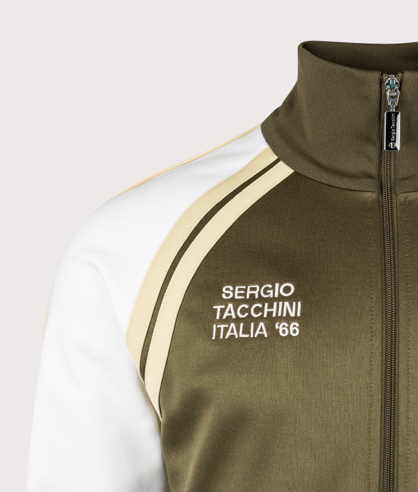 Sergio Tacchini Ghibli Davis Track Top in Dark Olive, Gardenia and Mojave Desert at EQVVS Menswear. Second detail shot.