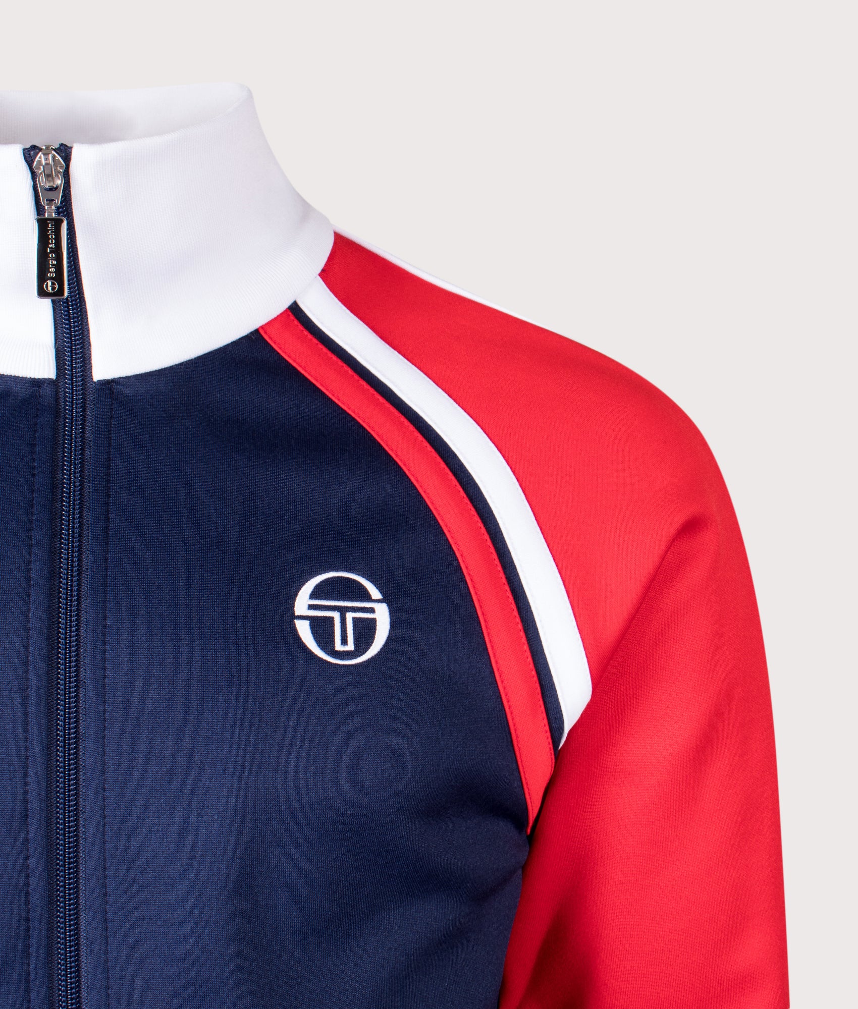 Sergio Tacchini Ghibli Davis Track Top in Maritime Blue, Adrenaline Rush and White at EQVVS Menswear. Detail shot.