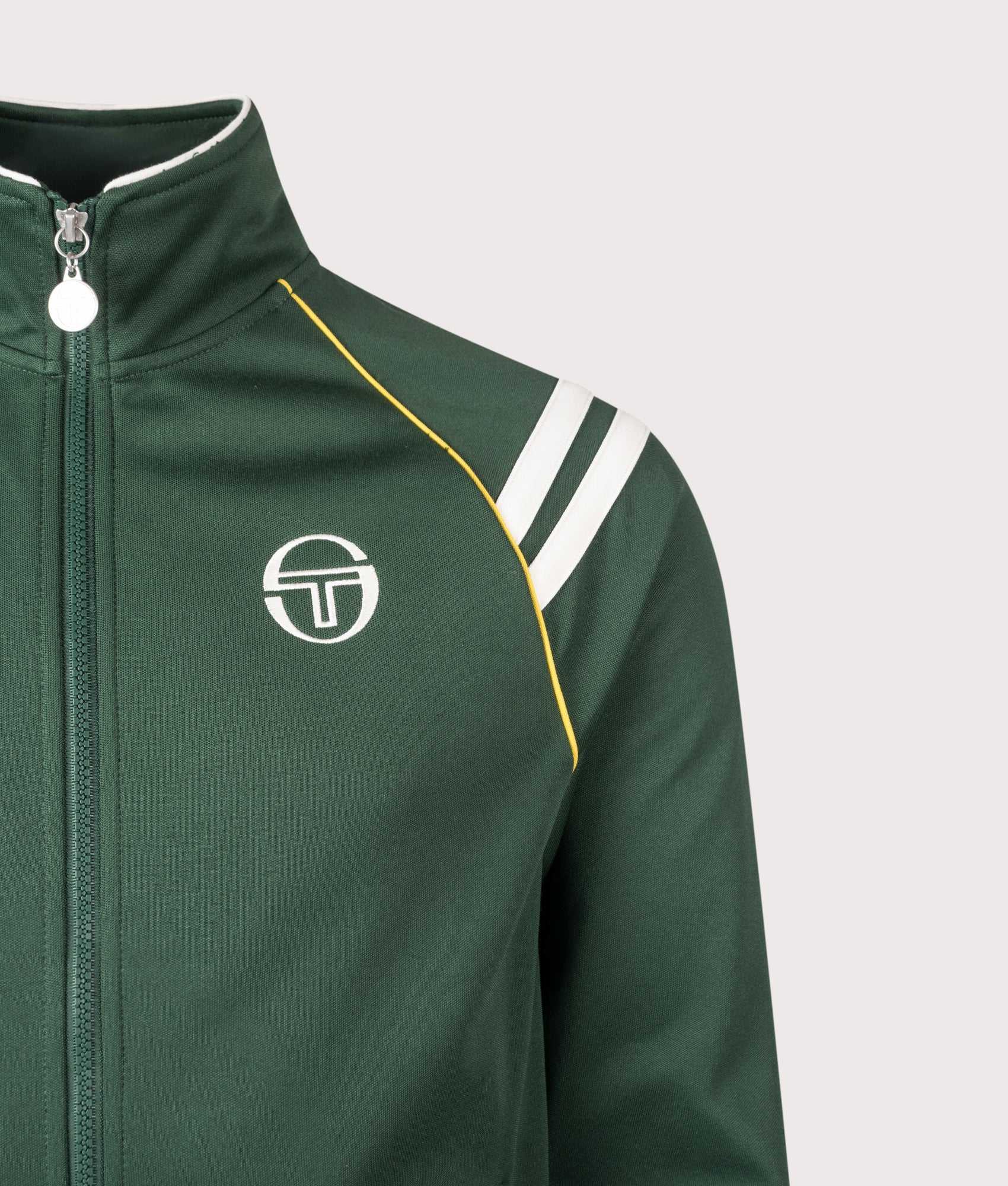 Sergio Tacchini New Cortana Track Top in Pine Needle and Gardenia at EQVVS Menswear. Detail shot.