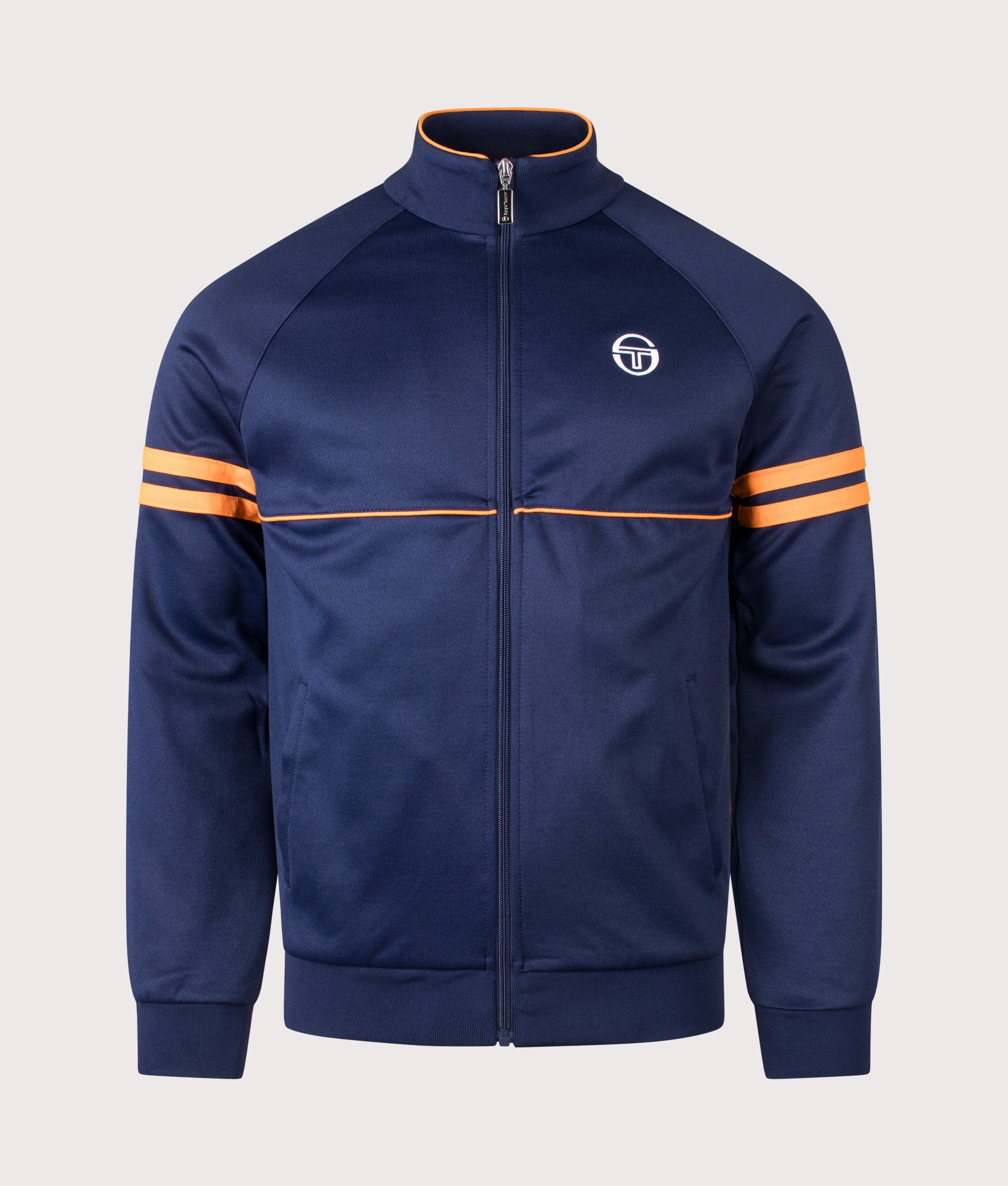 Sergio Tacchini Orion Track Top in Maritime Blue and Orange Pepper at EQVVS Menswear. Front shot.