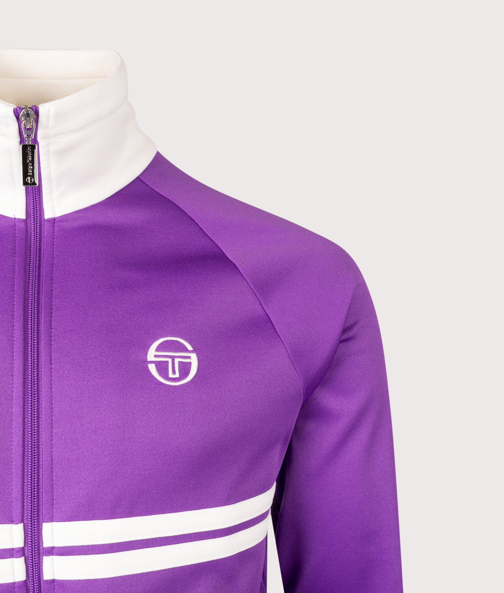 Sergio Tacchini Dallas Track Top in Pansy and Gardenia at EQVVS Menswear. Detail shot.