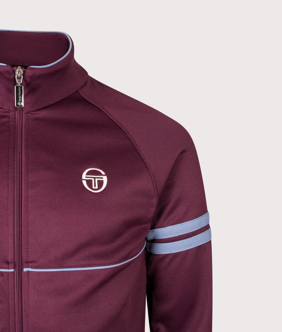 Sergio Tacchini Orion Track Top in Fig/Country Blue at EQVVS Menswear. Detail shot.