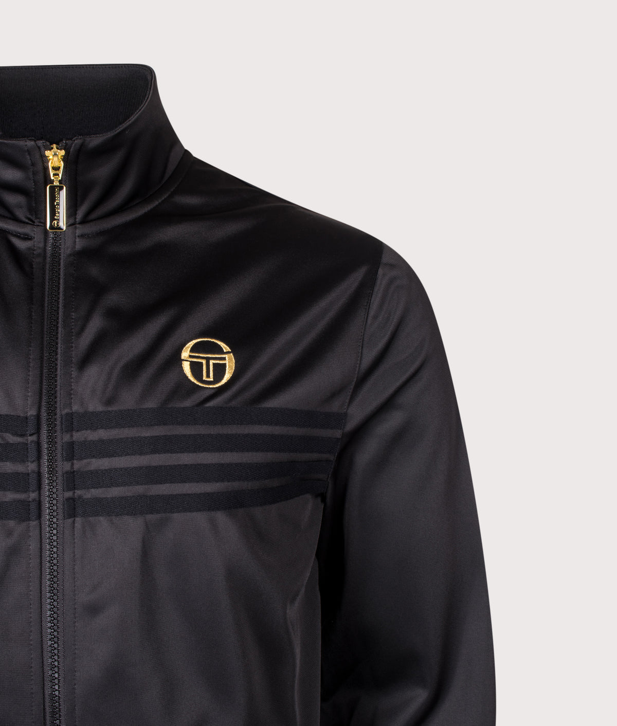 Sergio Tacchini in Black/Gold Lurex at EQVVS Menswear. Detail shot.