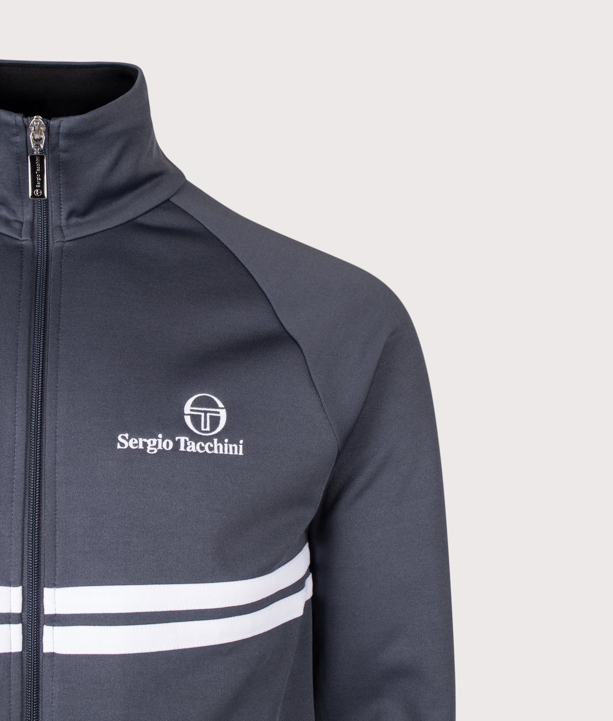 Sergio Tacchini Slim Fit New Dallas Track Top in Turbulence, White and Black at EQVVS Menswear. Detail shot.