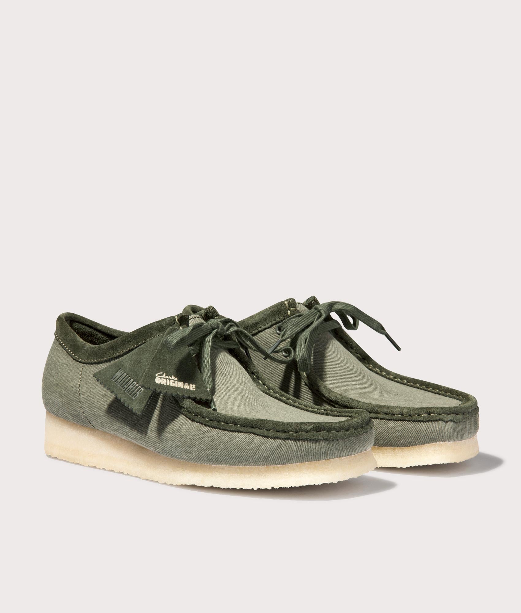 Wallabee Canvas in Forrest Green by Clarkes at EQVVS Menswear. Side Pair Shot.