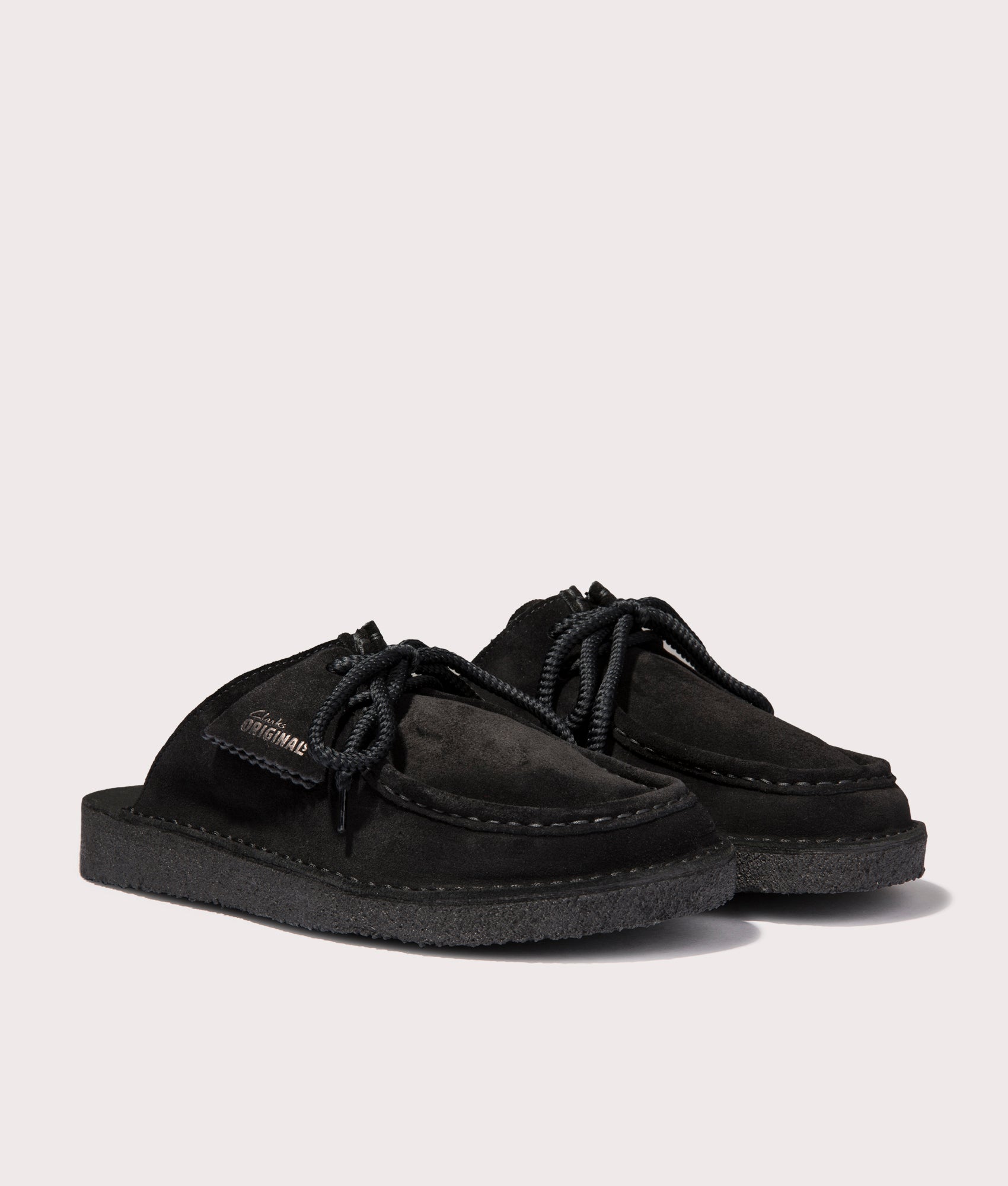 Desert Nomad Mule in Black Suede by Clarkes at EQVVS Menswear. Side Pair Shot.