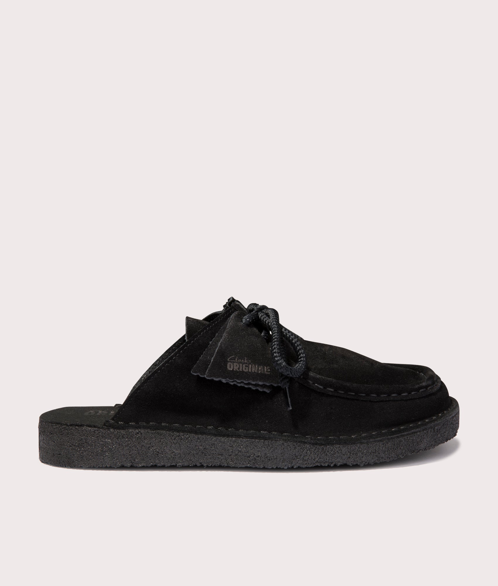 Desert Nomad Mule in Black Suede by Clarkes at EQVVS Menswear. Side Shot.