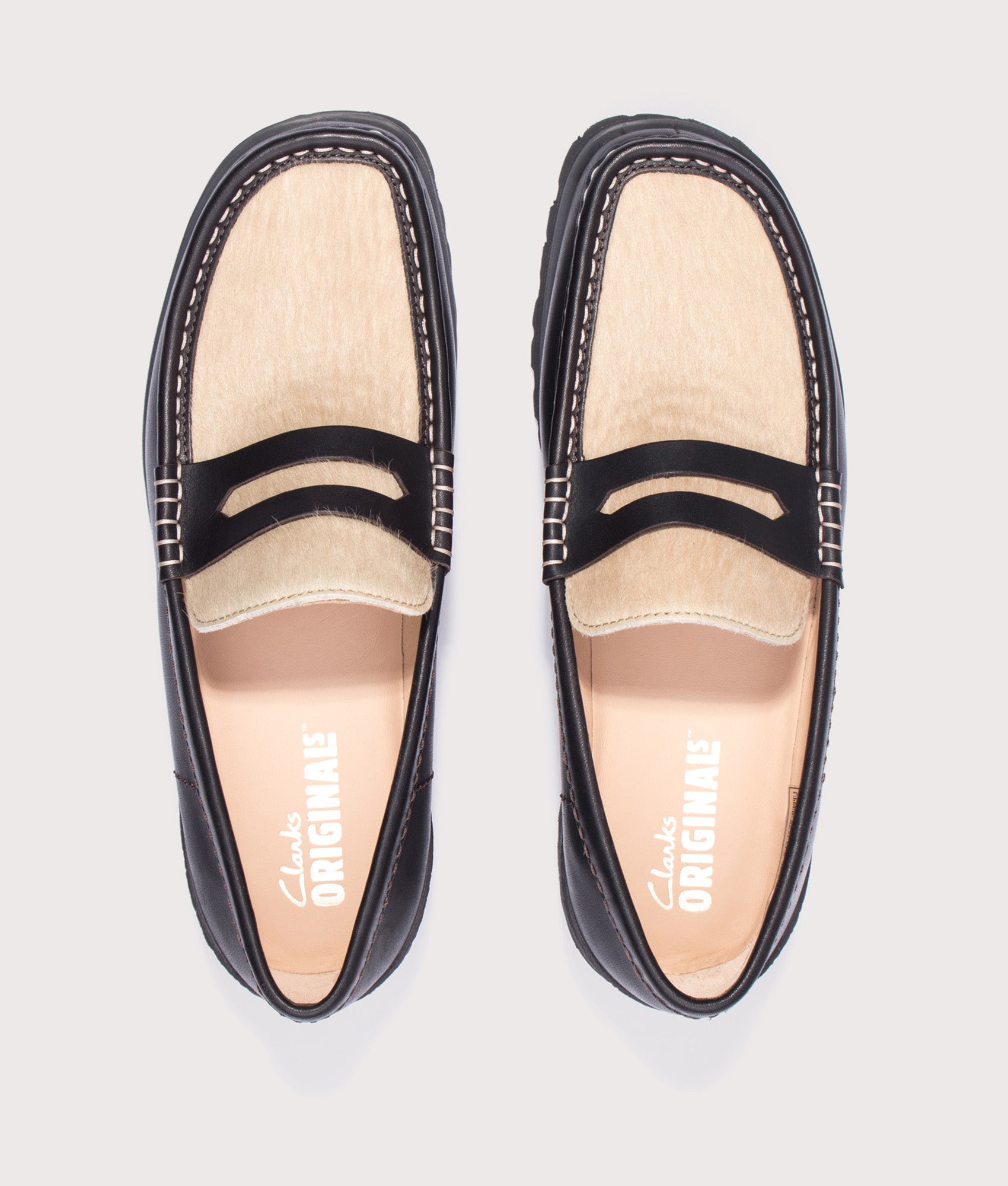 Clarks Original Yukoner Penny Loafers  in Brown Combi Leather at EQVVS Menswear. Top shot.