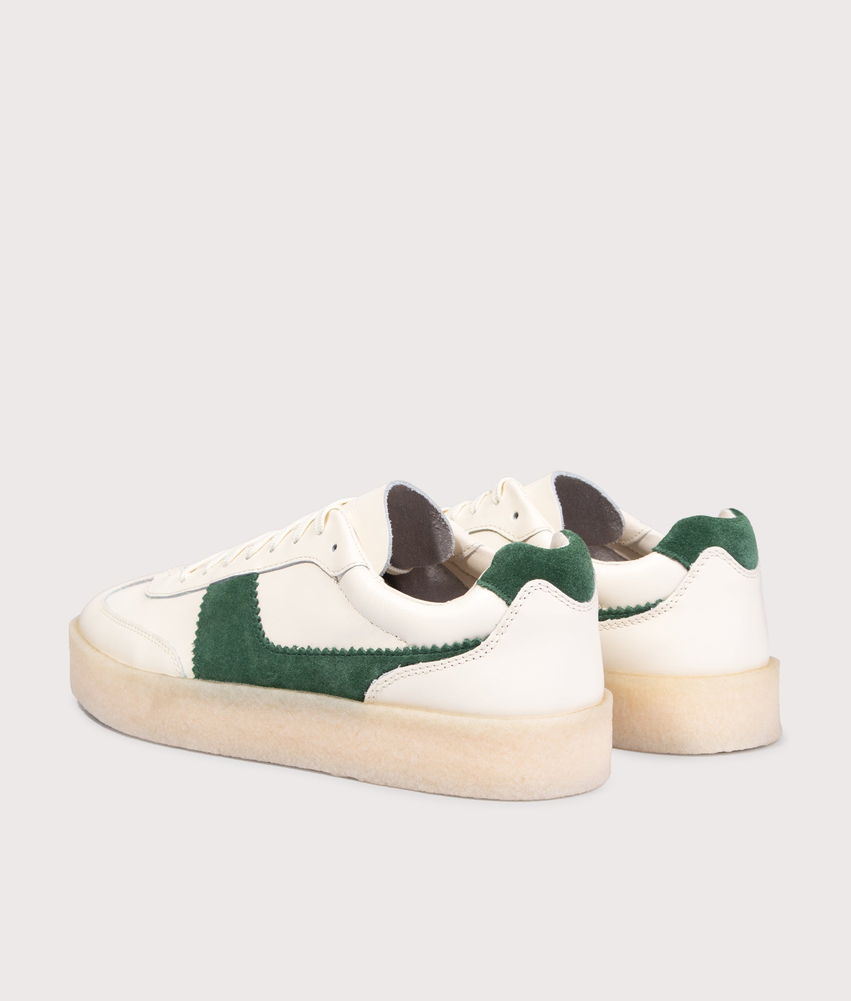 Clarks Original Tor 80 Sneakers in White Combi Leather at EQVVS Menswear. Angled back shot.