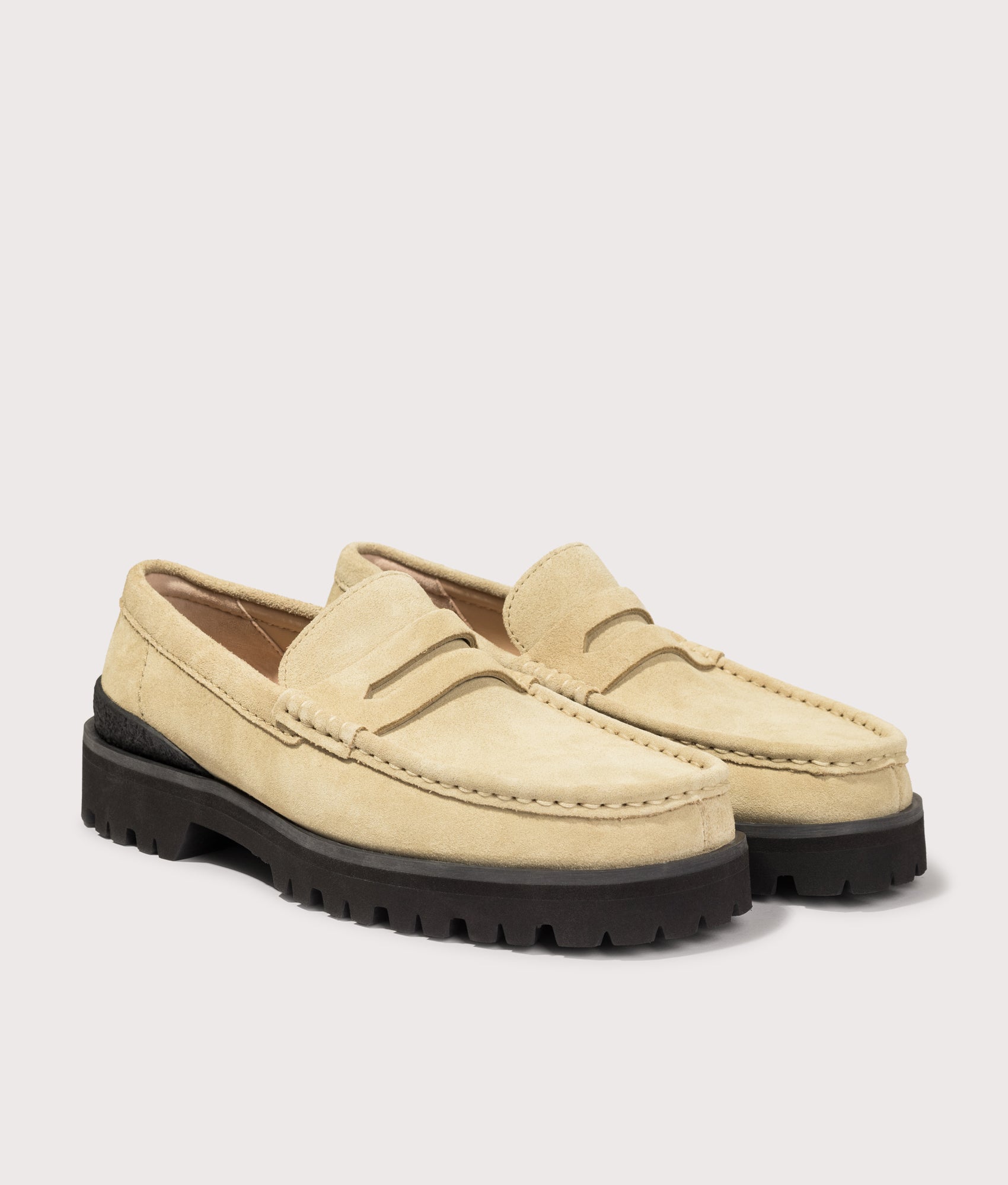 Clarks Originals Yukoner Penny Loafers in Maple Suede at EQVVS Menswear. Angled front shot.