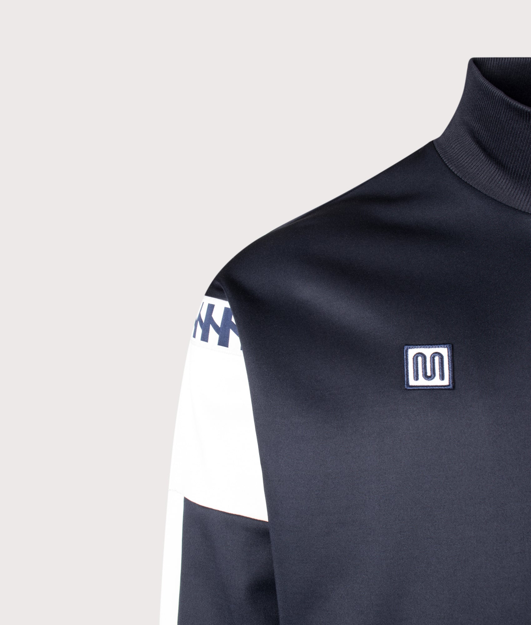 Meyba Cut And Sew Track Jacket in Navy by Fred Perry. Shot by EQVVS. Detail shot.