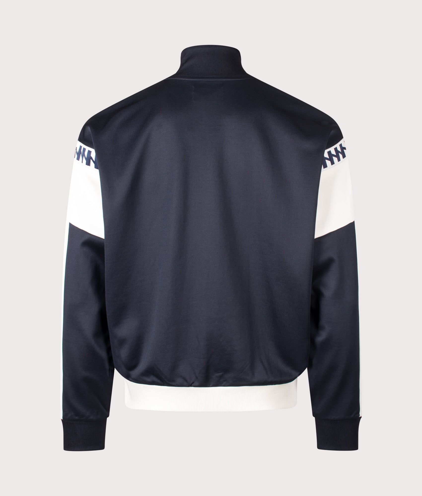Meyba Cut And Sew Track Jacket in Navy by Fred Perry. Shot by EQVVS. Back shot.