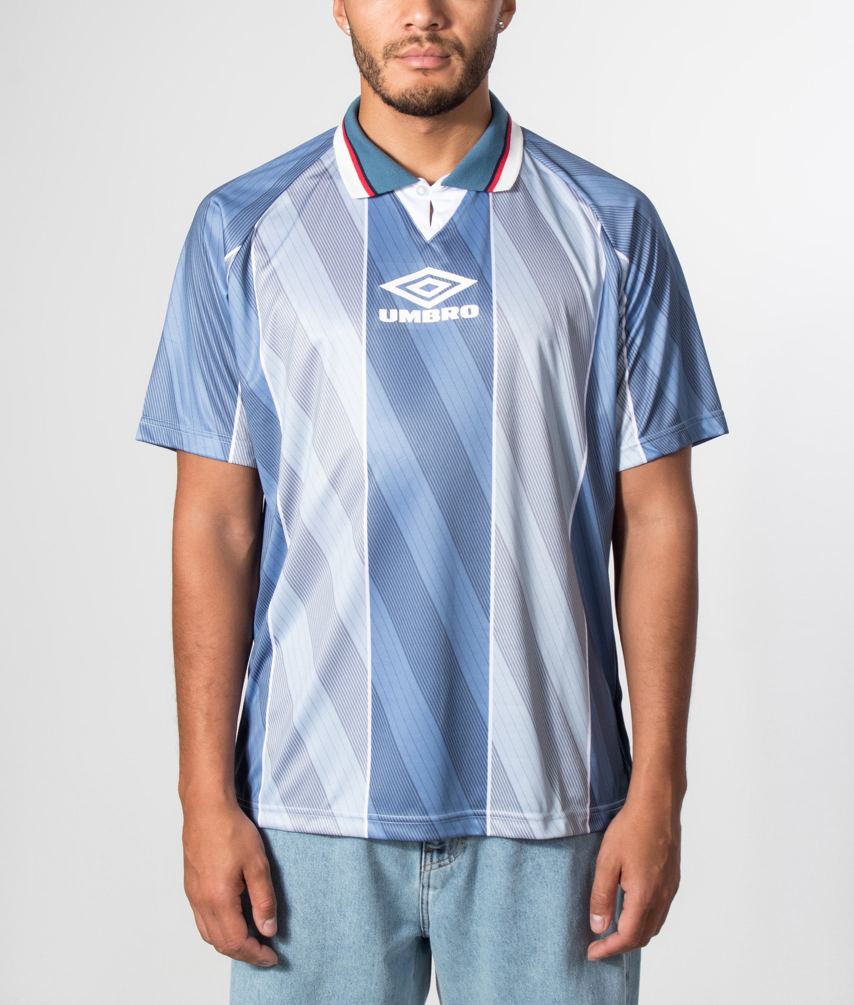 Umbro Away Football Jersey in Grey at EQVVS Menswear. Model front shot.