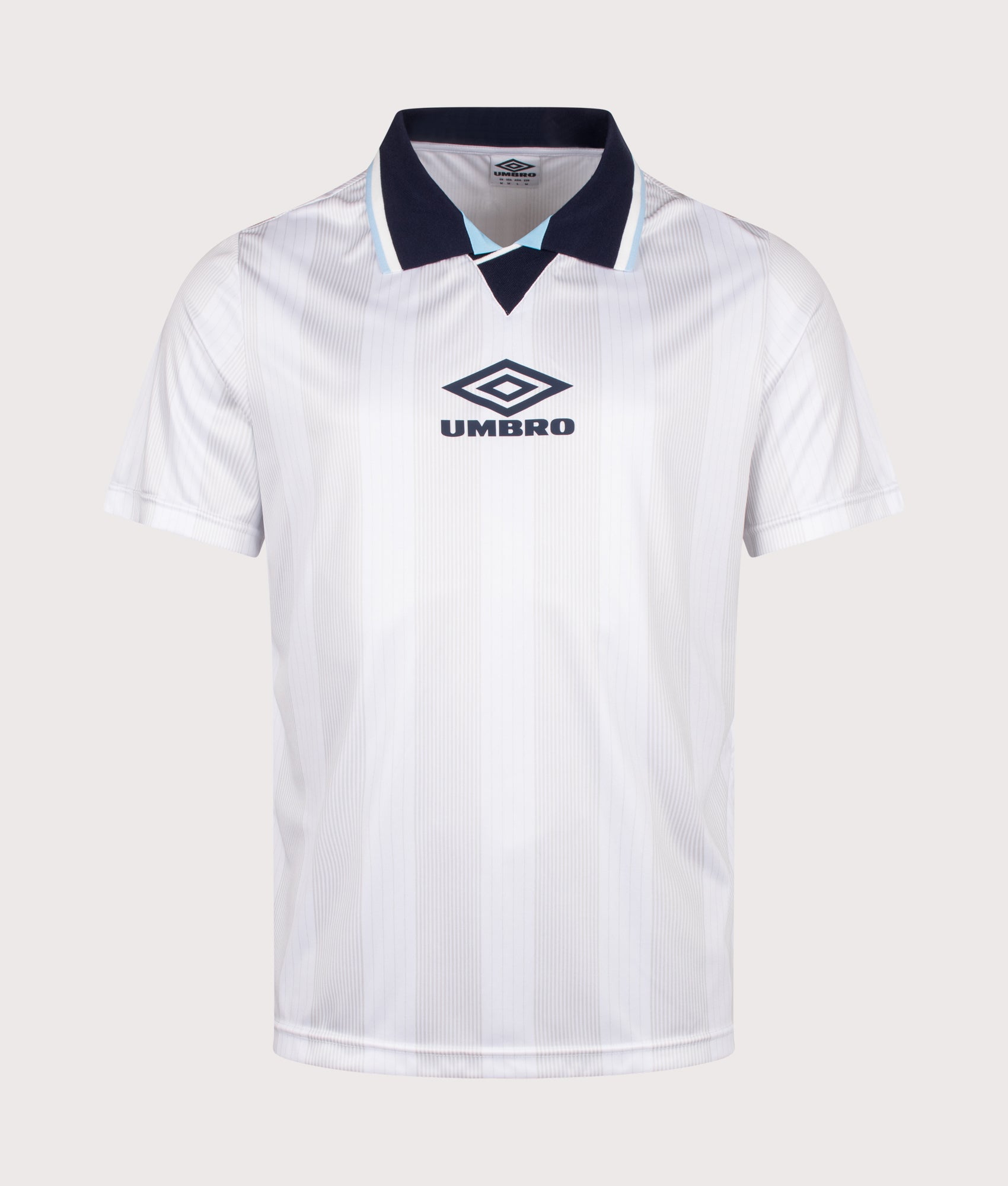 Umbro Tournament Football Jersey in white at EQVVS Menswear. Front shot.