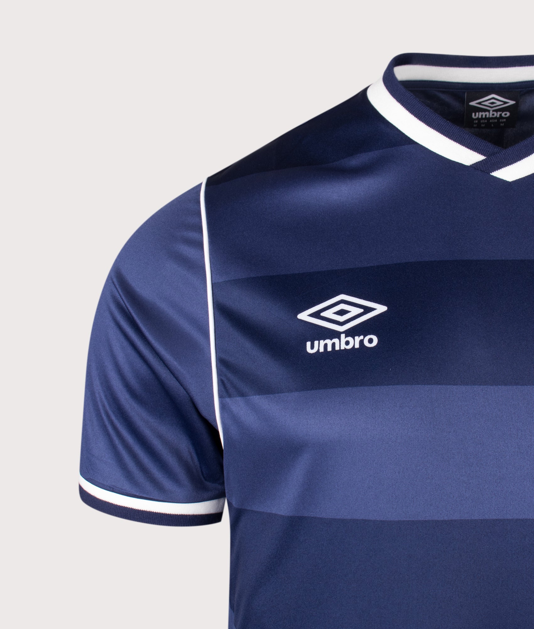 Umbro Jersey NR 7 in Patriot Blue at EQVVS Menswear. Detail shot.
