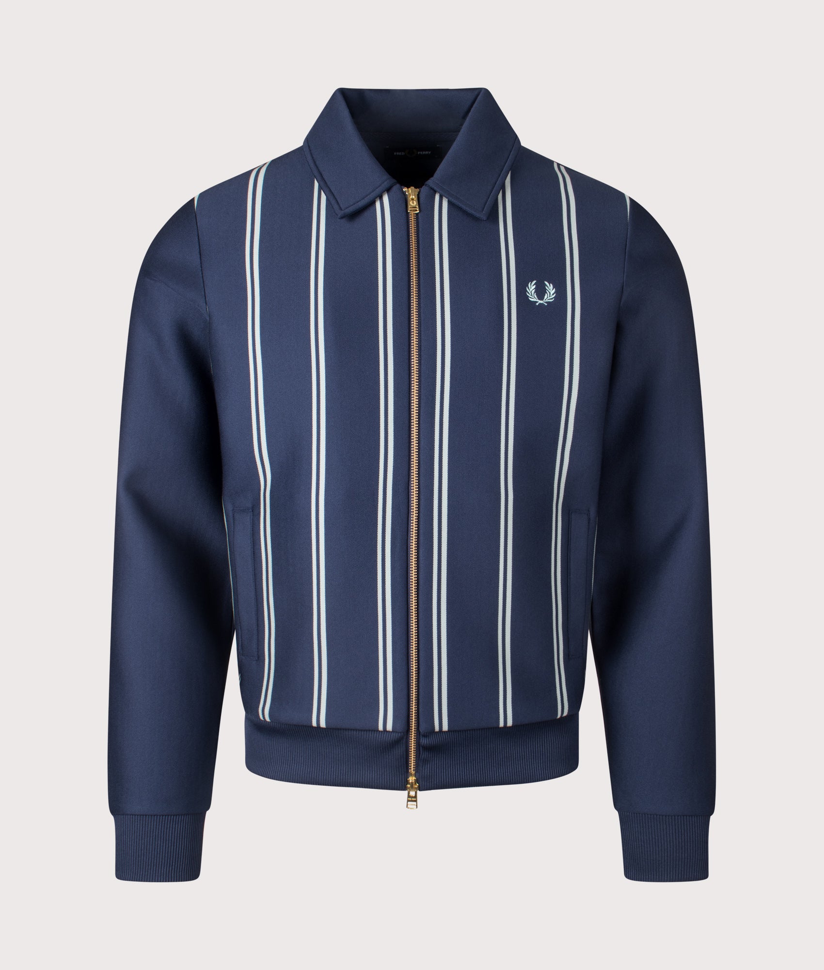 Striped Collared Track Top in Tennis Blue by Fred Perry. Shot at EQVVS. Front shot. 