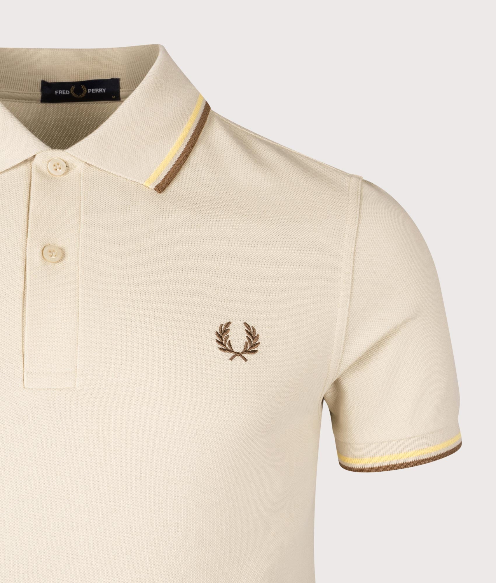 Twin Tipped Fred Perry Polo Shirt. Shot by EQVVS. Detail shot.