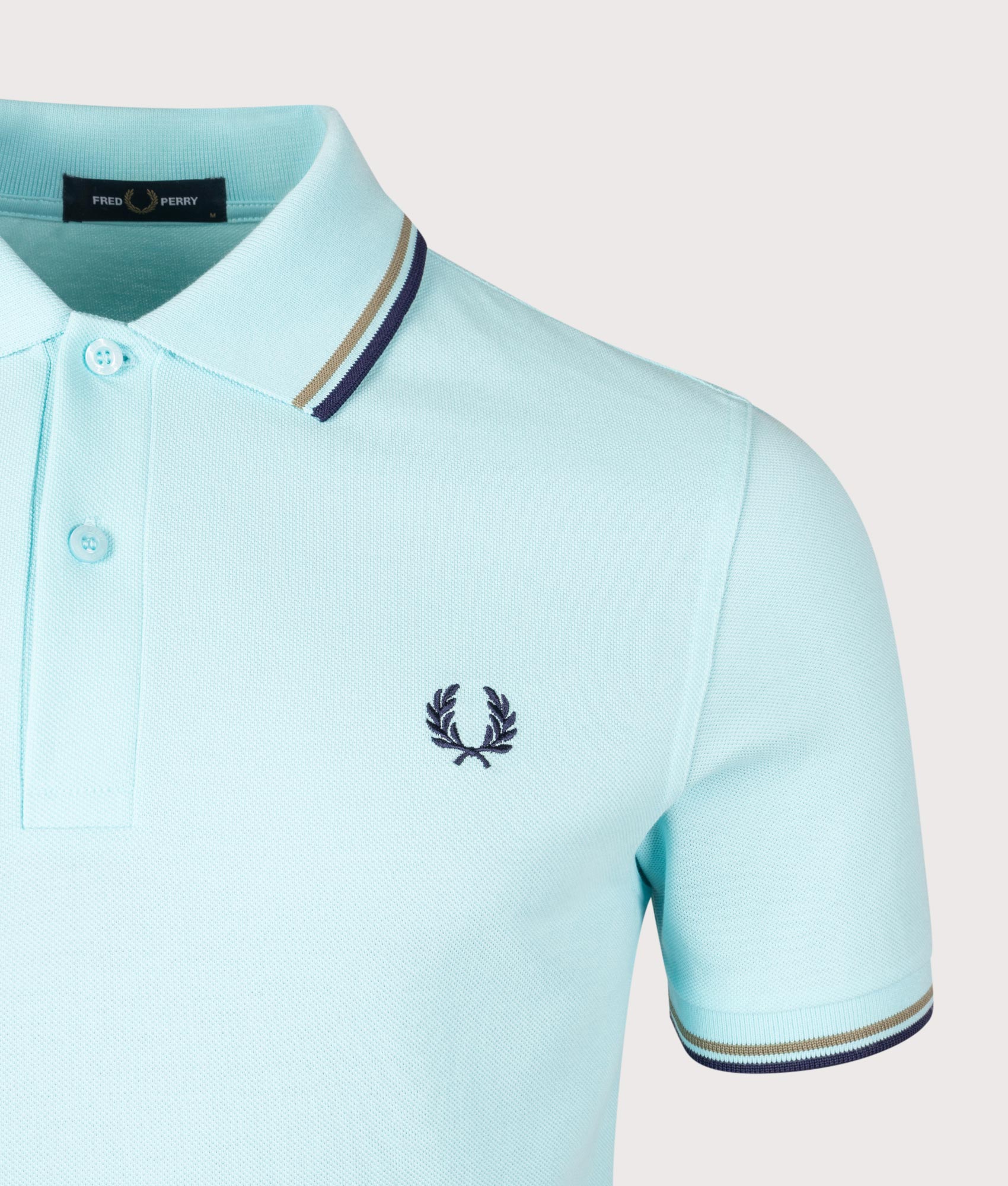 Twin Tipped Fred Perry Polo Shirt. Shot by EQVVs. Detail shot.