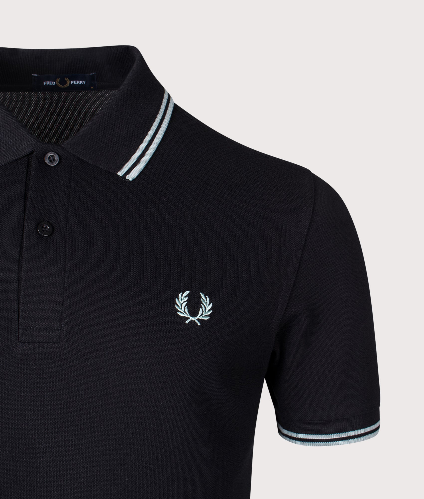 Twin Tipped Fred Perry Polo Shirt. Shot by EQVVS. Detail shot 