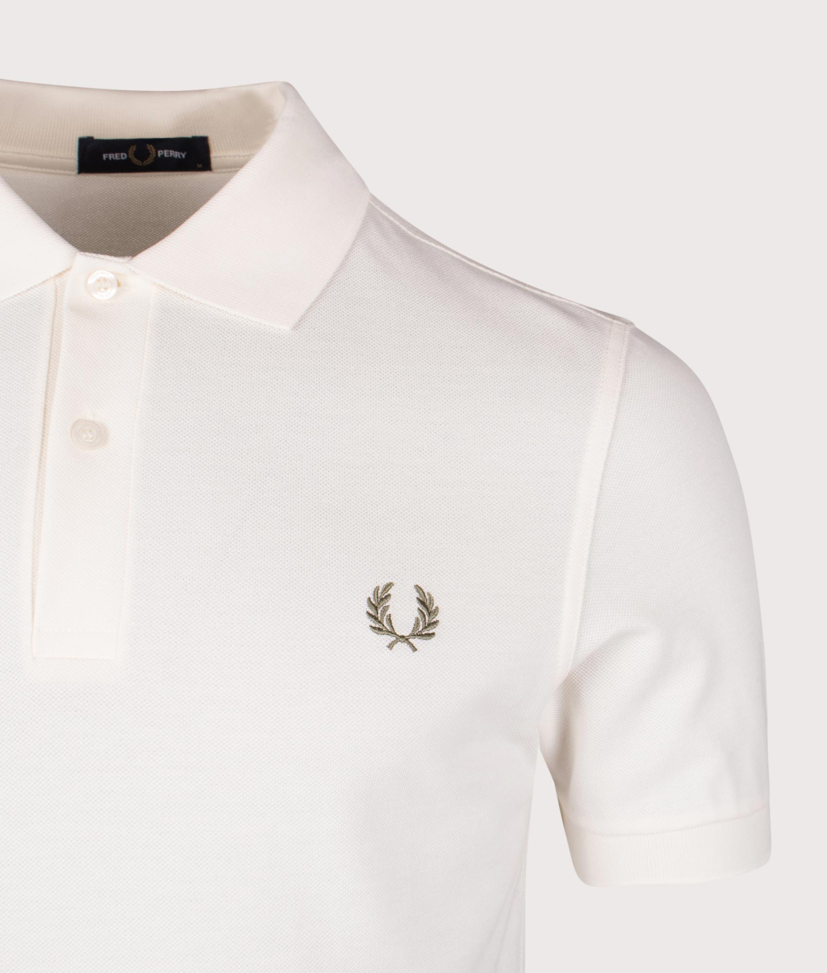 The Fred Perry Polo Shirt. Shot b EQVVS. Detail Shot
