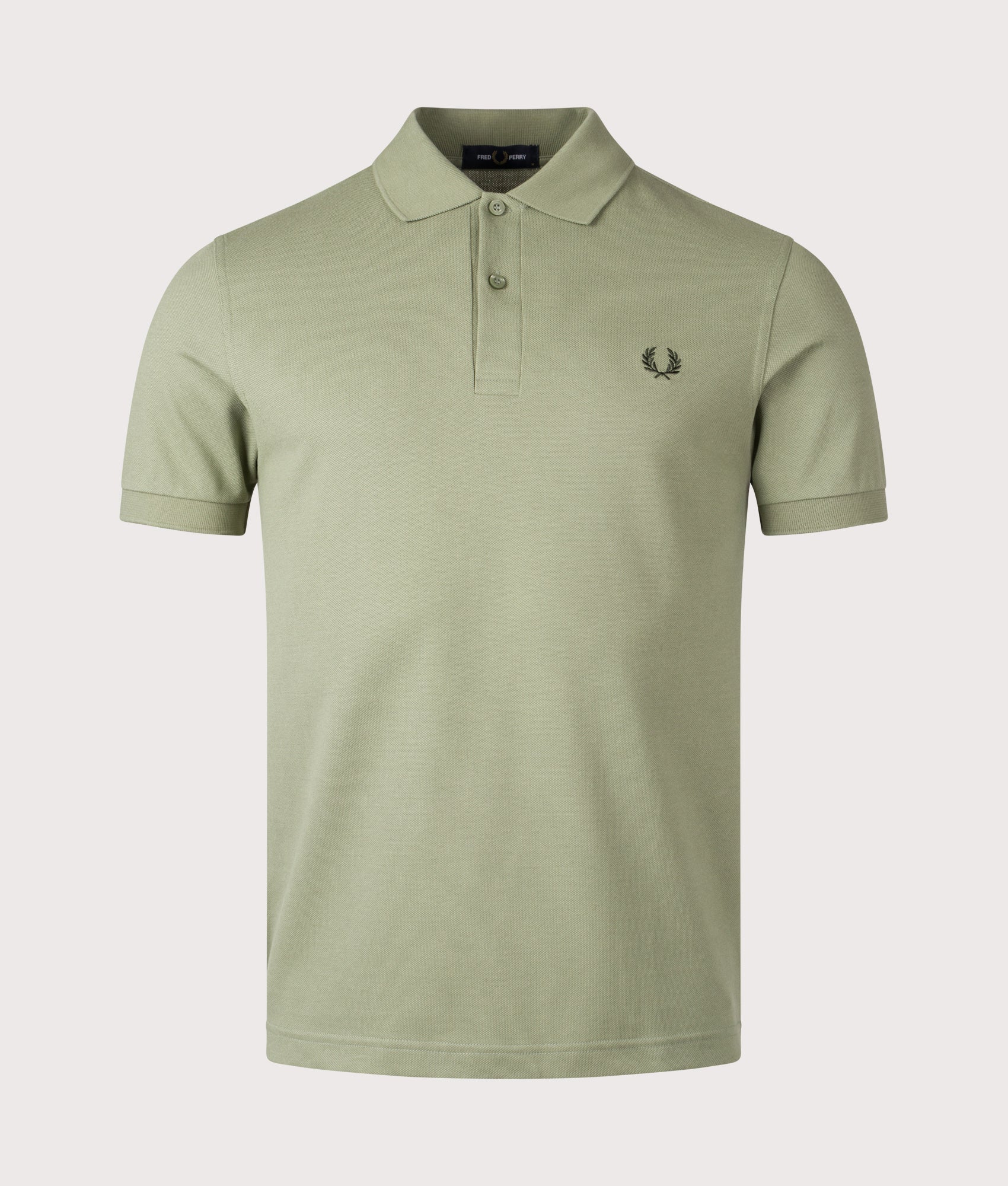 The Fred Perry Polo Shirt. Shot by EQVVS. Front shot.