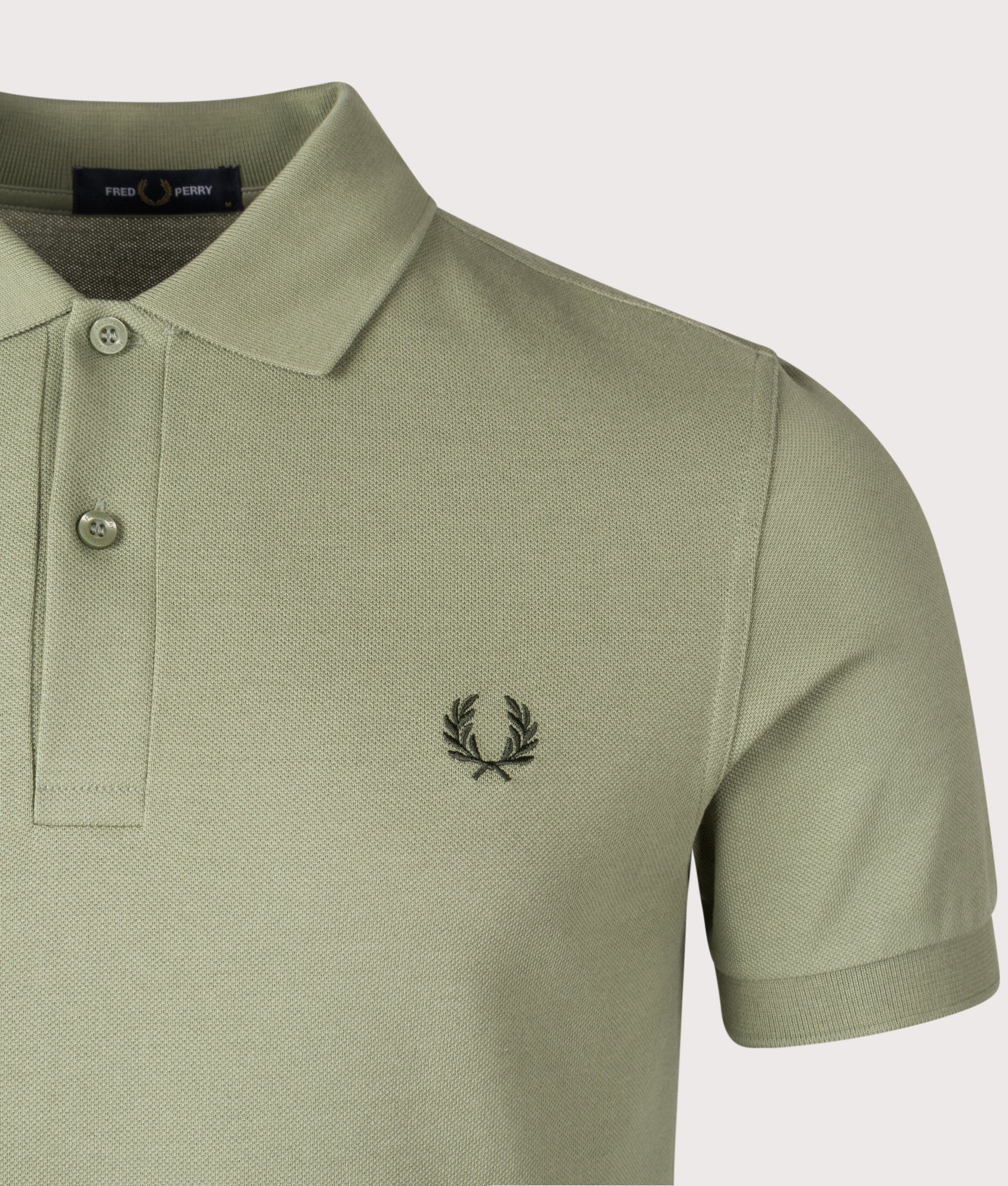 The Fred Perry Polo Shirt. Shot by EQVVS. Detail shot.