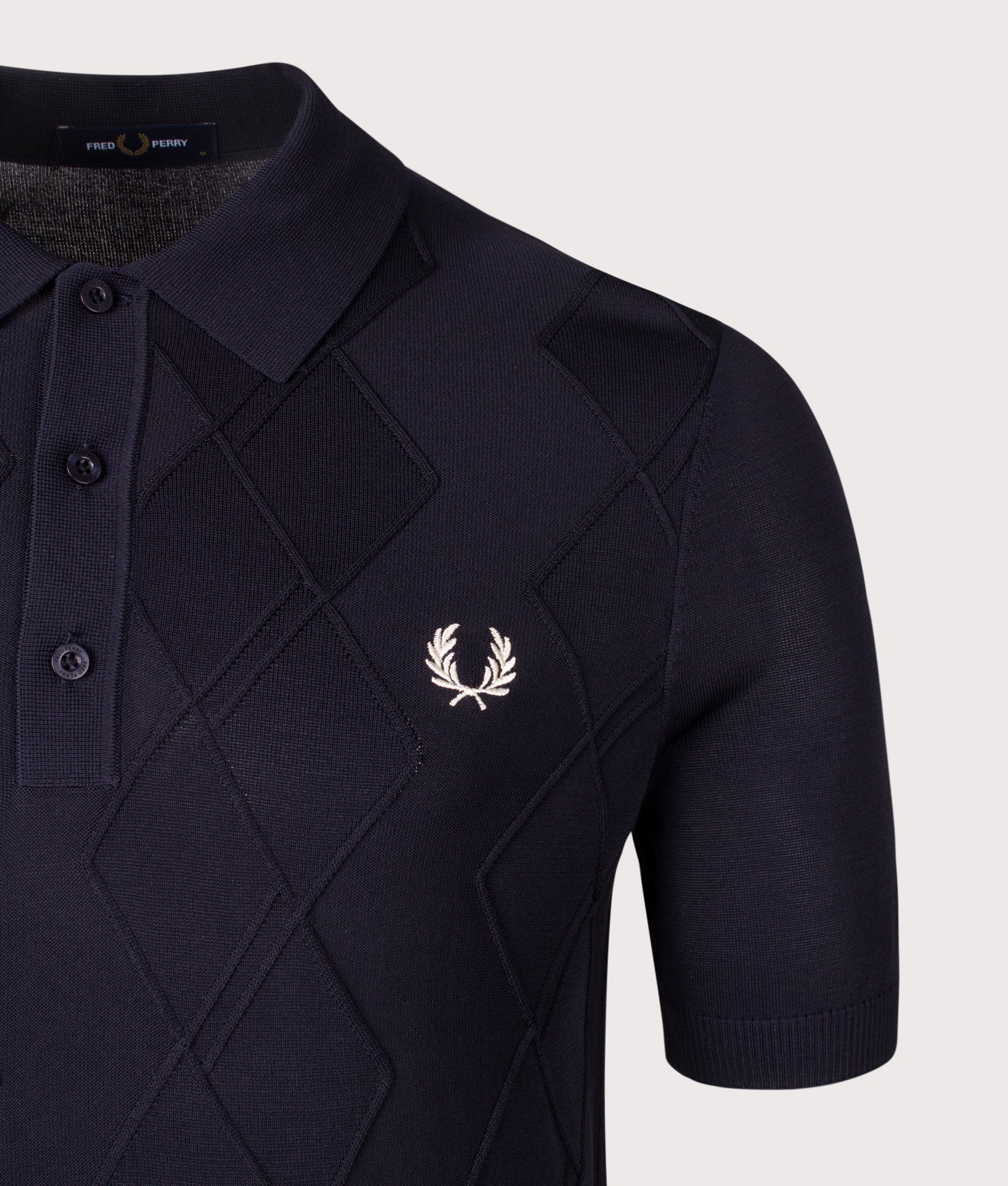 Cable Knitted Polo Shirt. Shot by EQVVS. Detail shot. 