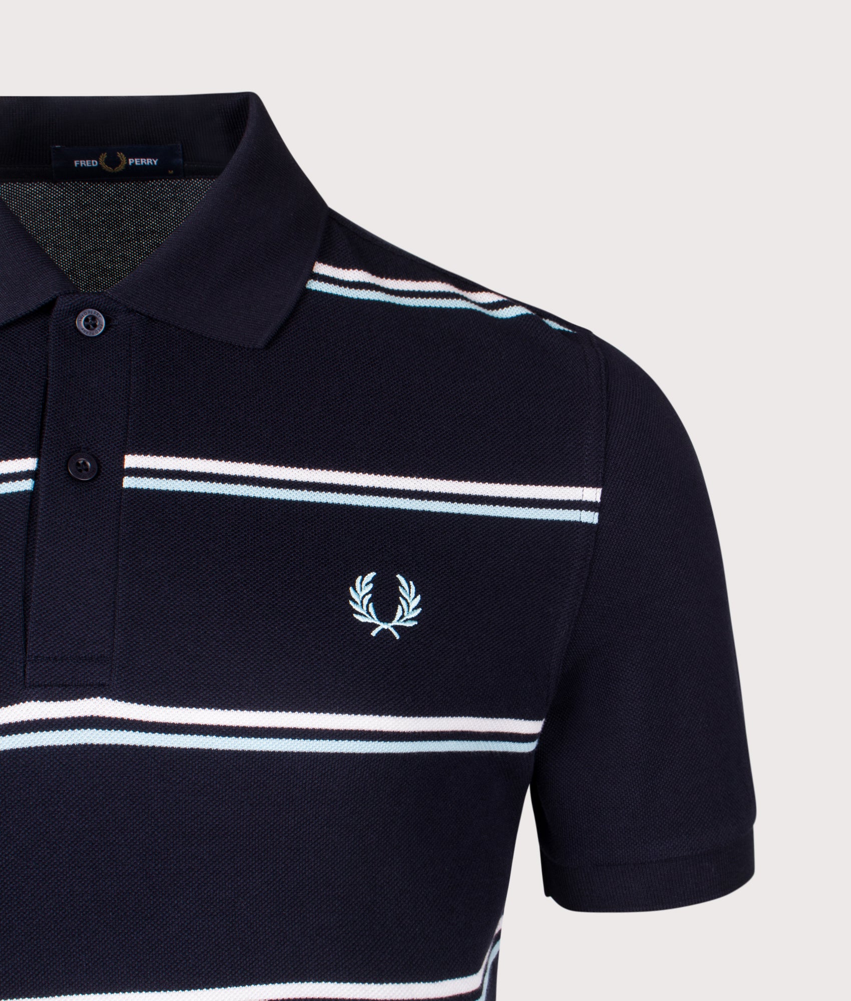 Striped Polo Shirt. shot by EQVVVS. Front detail shot.