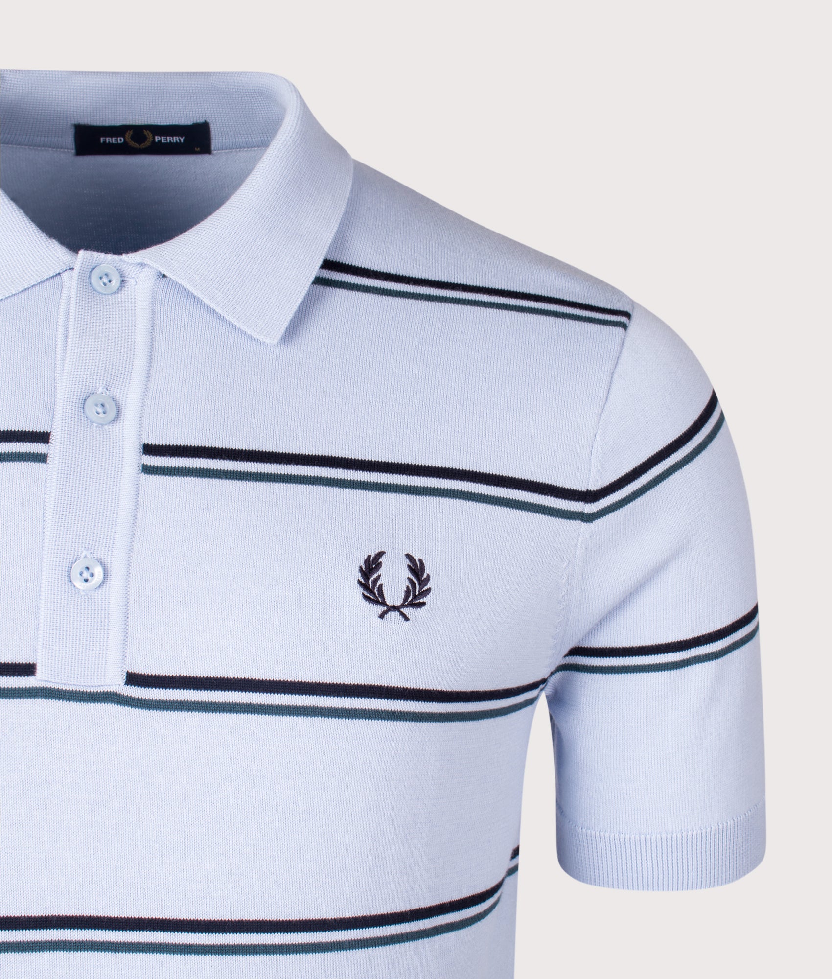 Striped Knitted Polo Shirt. Shot by EQVVS. Detail shot.