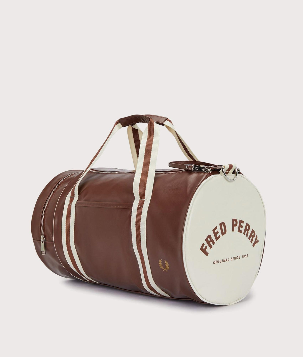 Fred Perry Classic Barrel Bag in Tan and Ecru at EQVVS Menswear. Angled front shot.