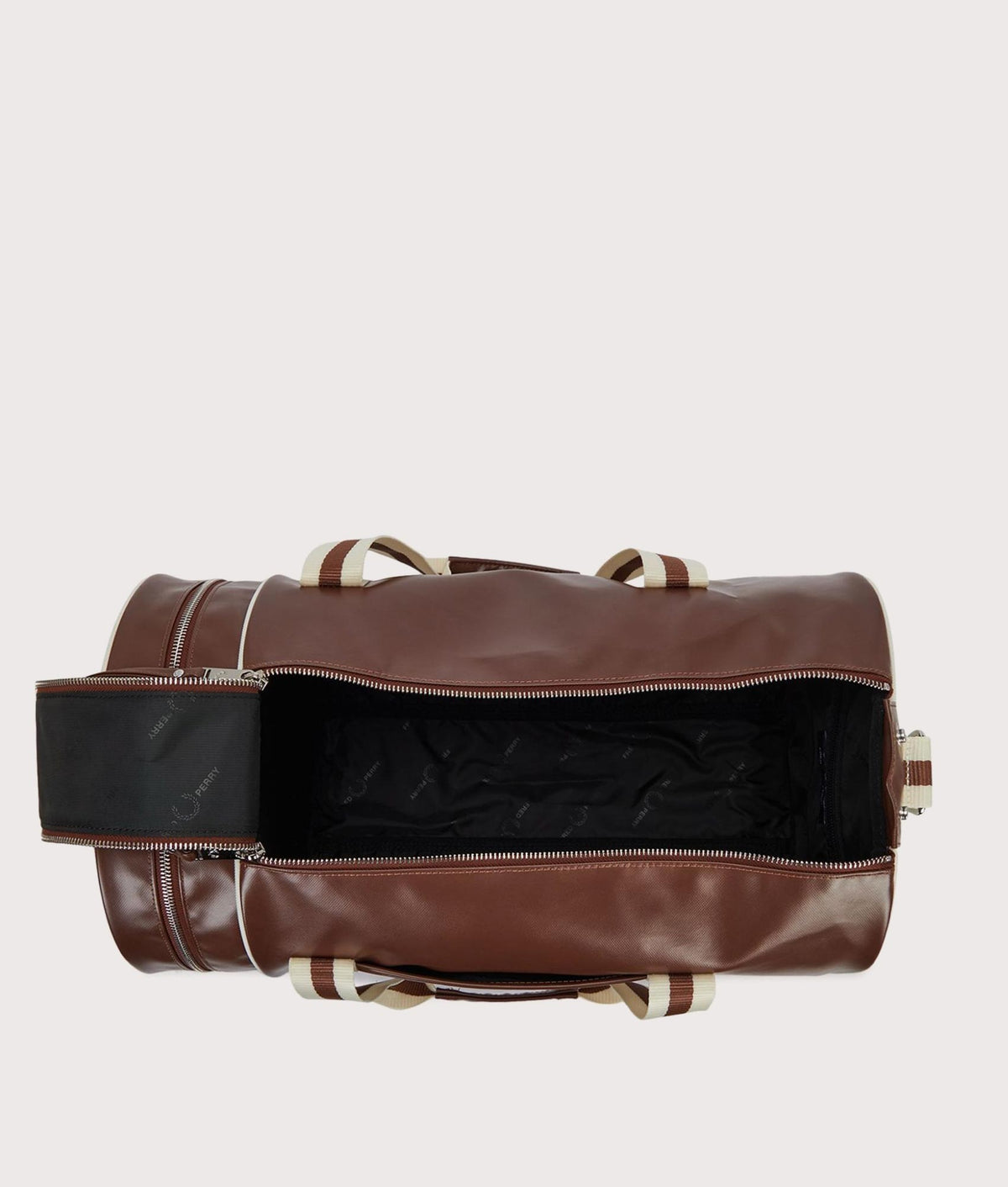 Fred Perry Classic Barrel Bag in Tan and Ecru at EQVVS Menswear. Top shot.