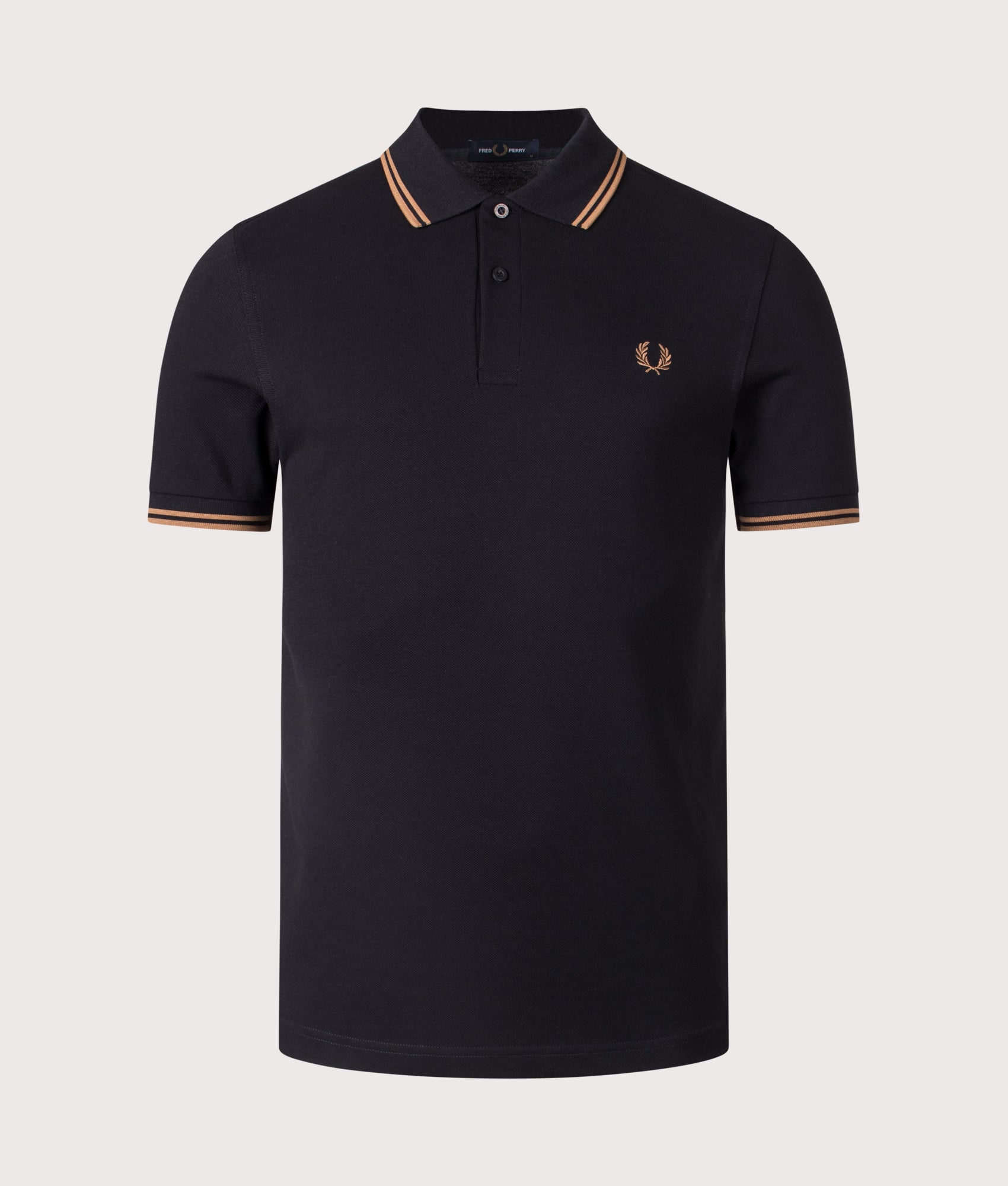 Twin Tipped Fred Perry Polo Shirt. Shot by EQVVS. Front shot.