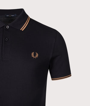 Twin Tipped Fred Perry Polo Shirt. Shot by EQVVS. Detail shot.