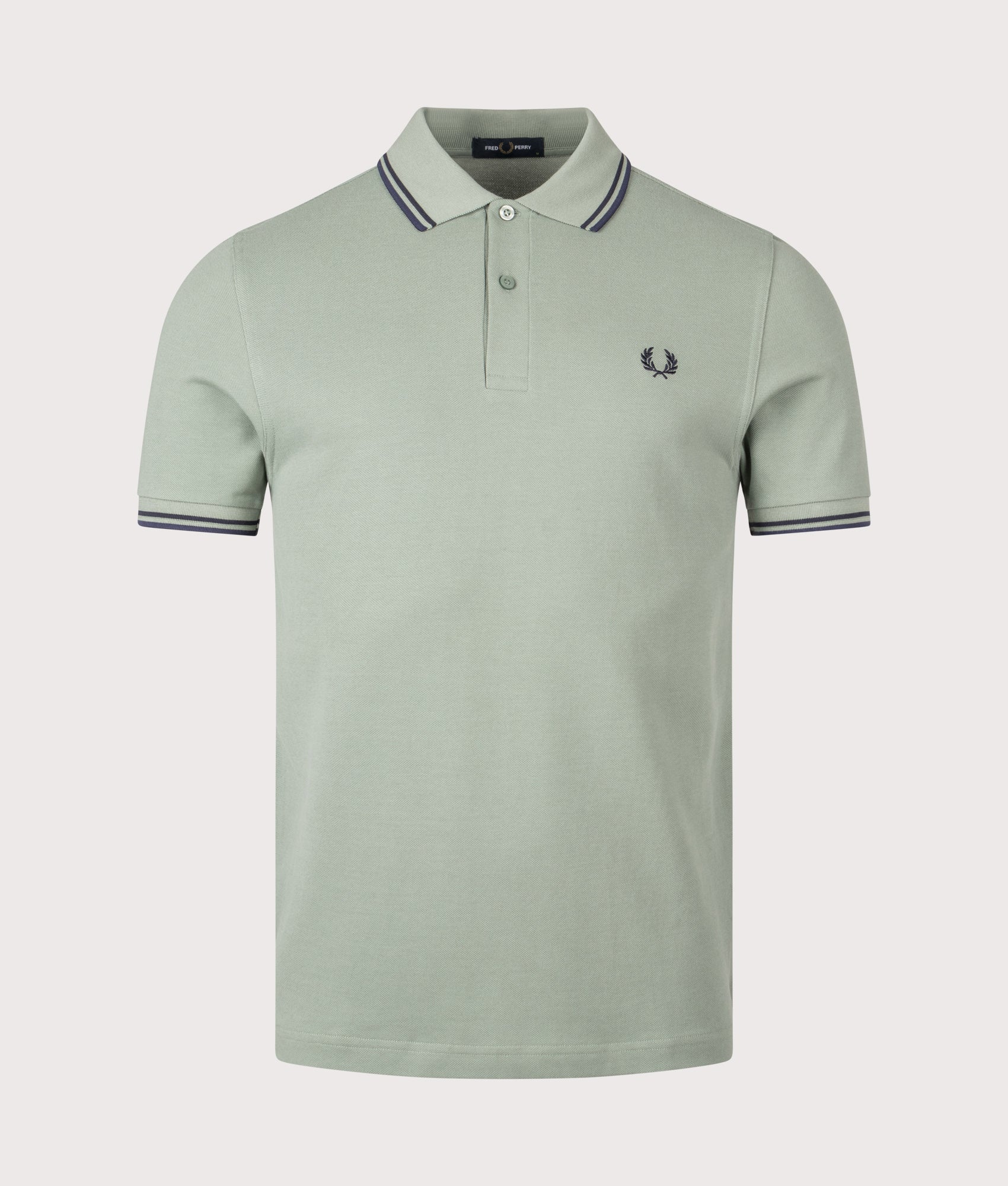Twin Tipped Fred Perry Polo Shirt. Shot by EQVVS. Front shot.