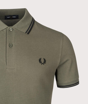 Twin Tipped Fred Perry Polo Shirt. Shot by EQVVS. Detail shot.